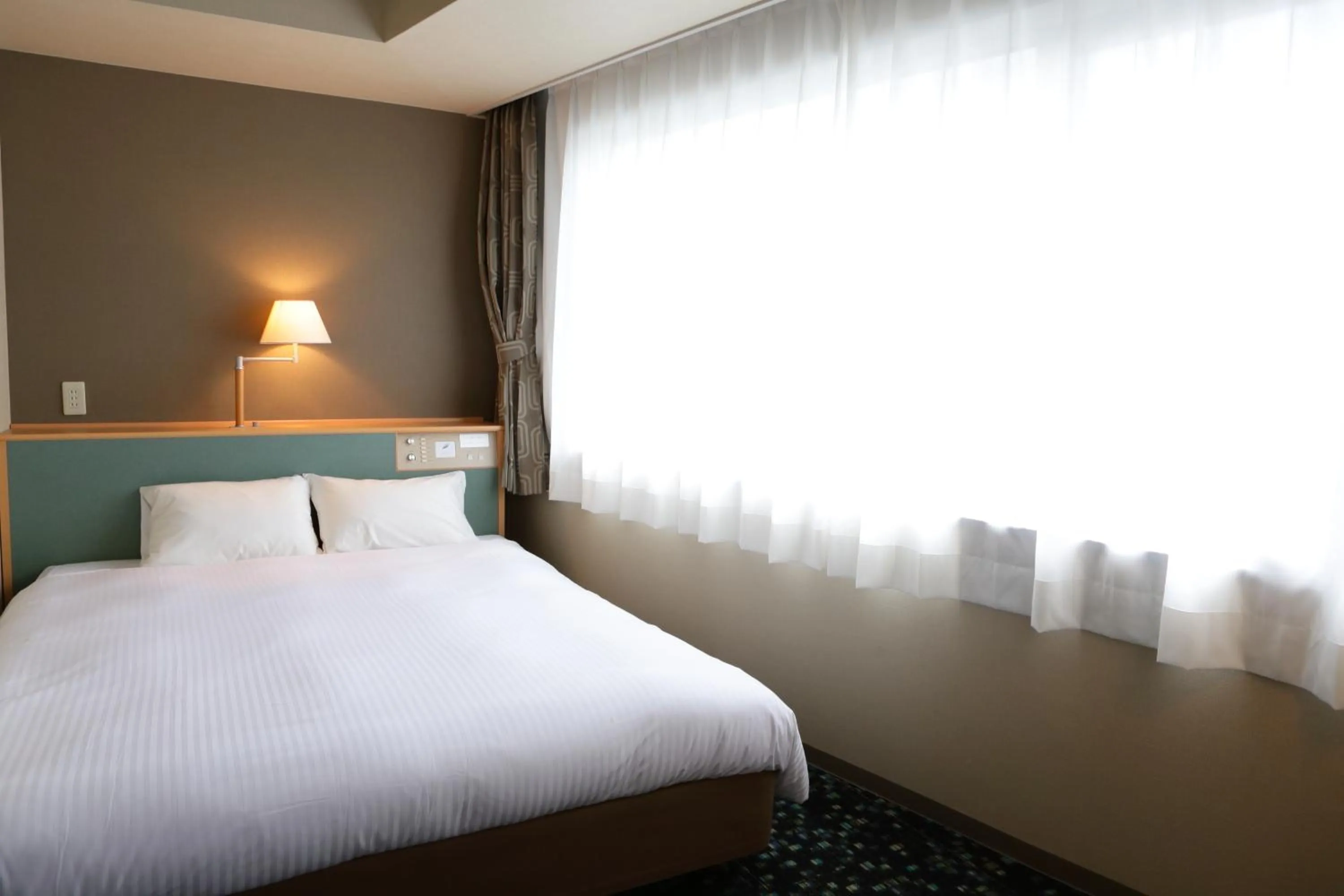 Bed in Hotel Premium Green Hills