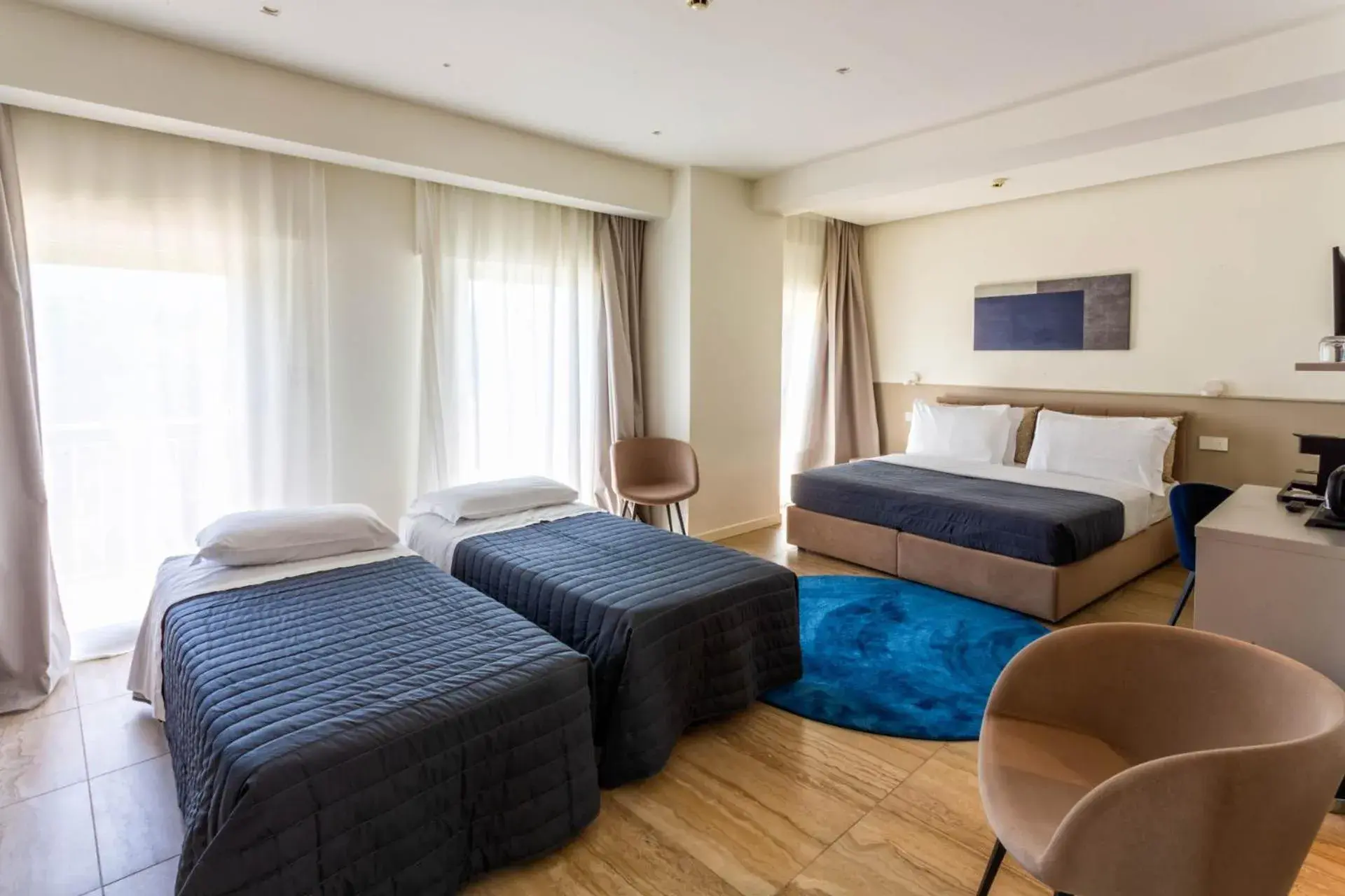 Family Room with Terrace in Hotel Petit Palais Family Room with Terrace in Hotel Petit Palais