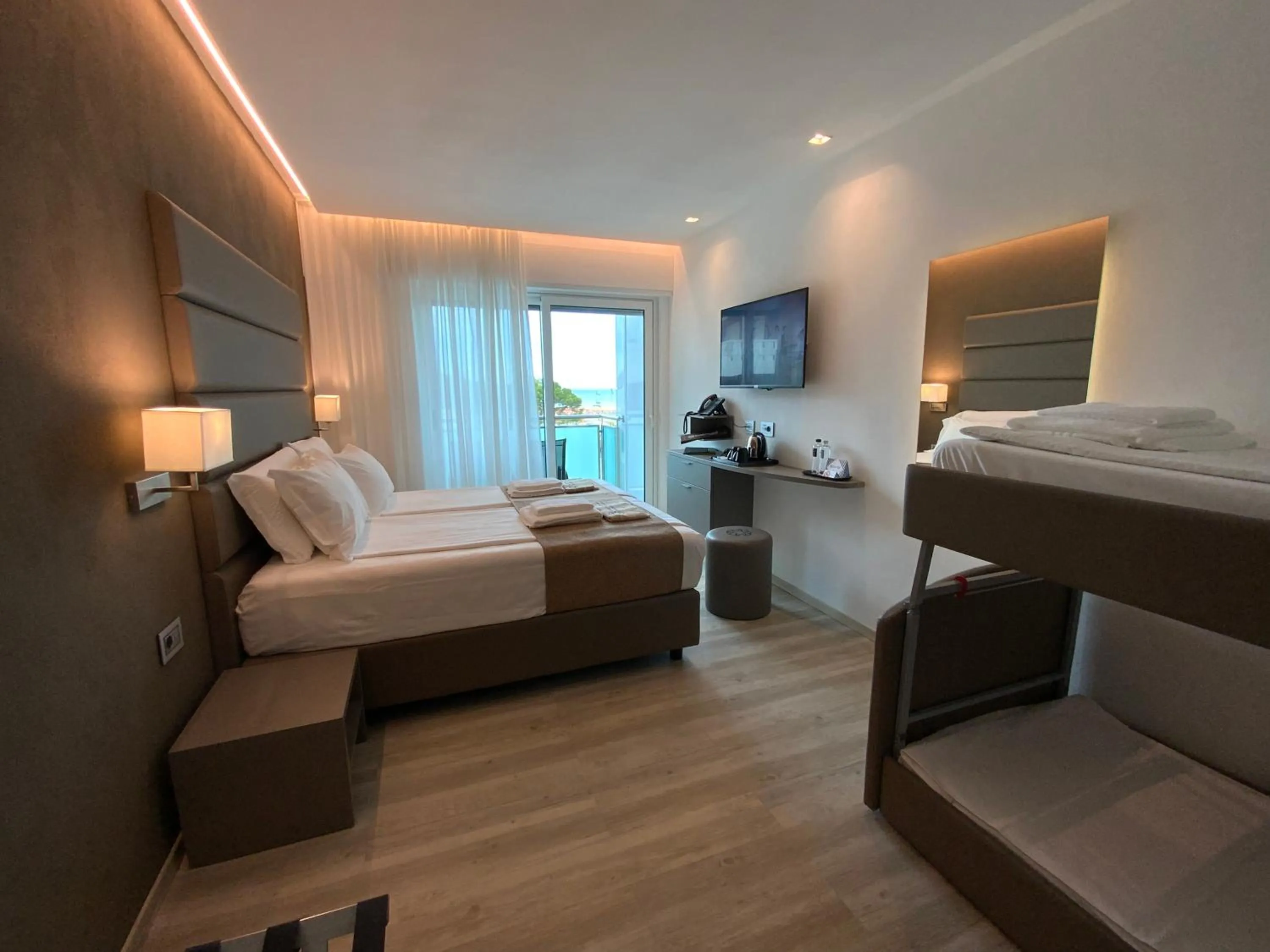 Photo of the whole room, Bed in International Beach Hotel