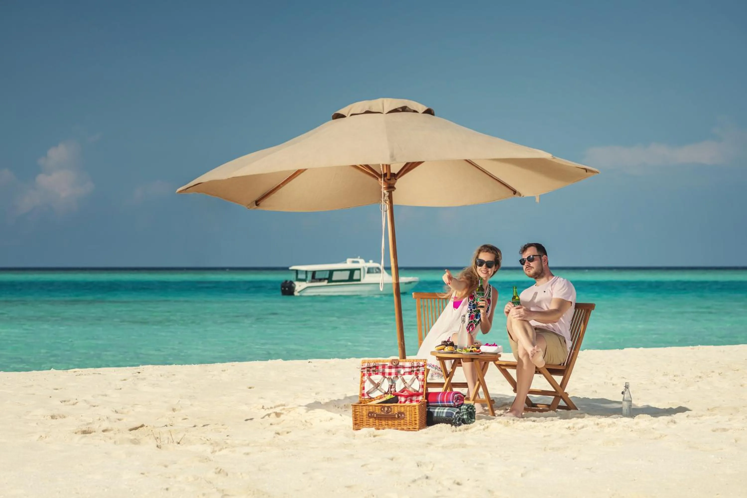 Beach in Sun Siyam Iru Fushi with Free Transfer