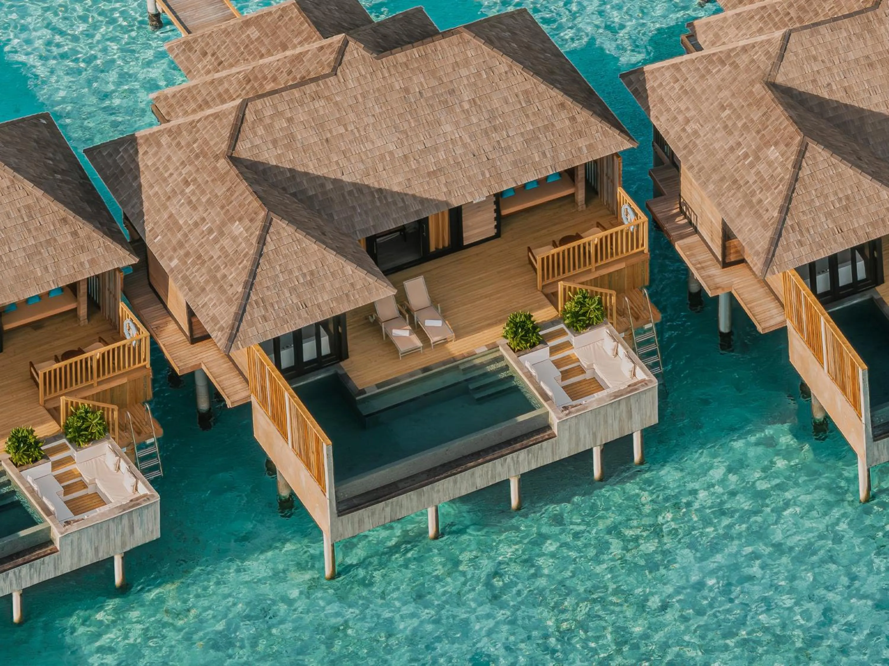 Bedroom in Sun Siyam Iru Fushi with Free Transfer