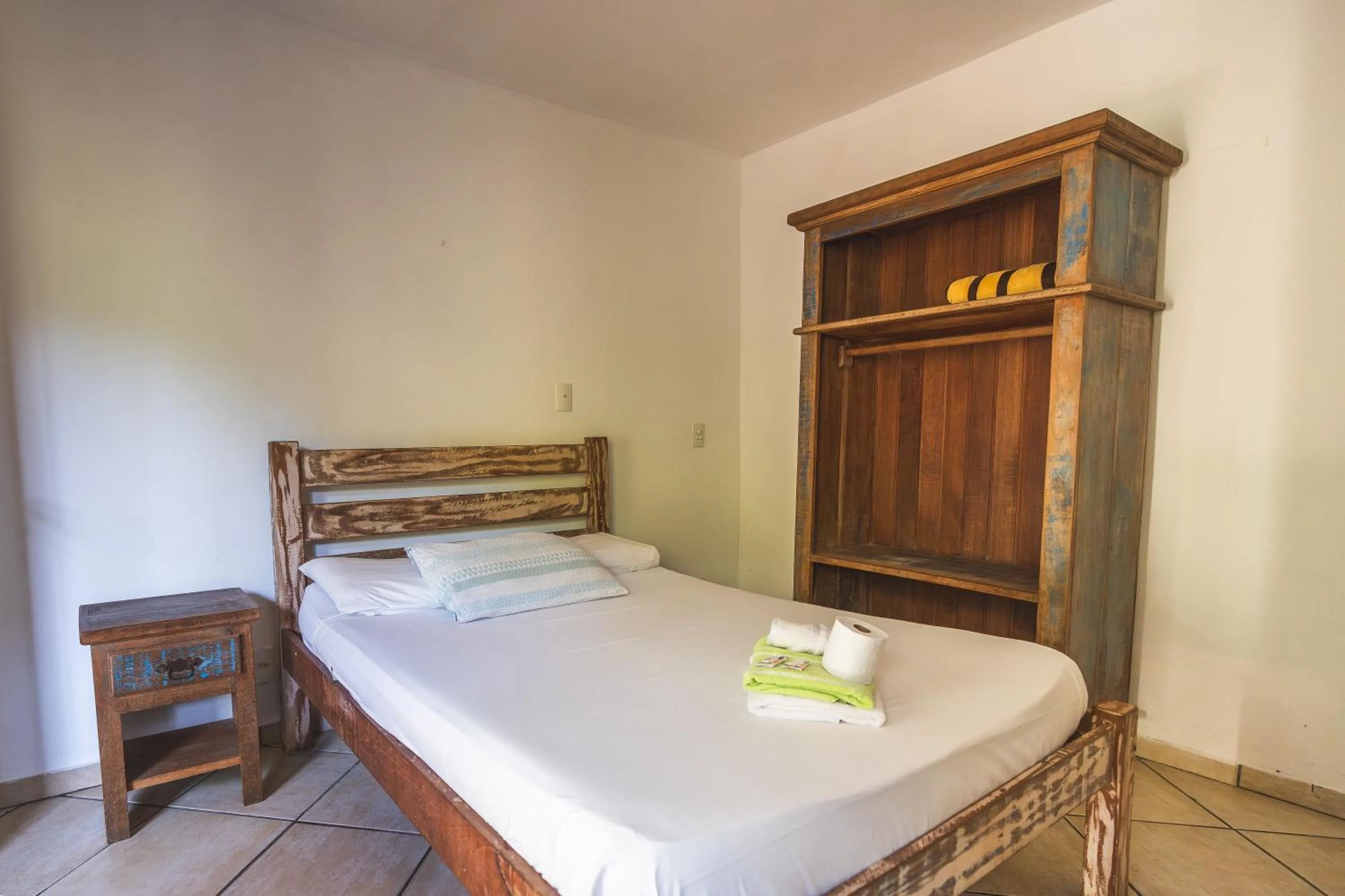 Bed in POUSADA ENCANTO DO AMOR