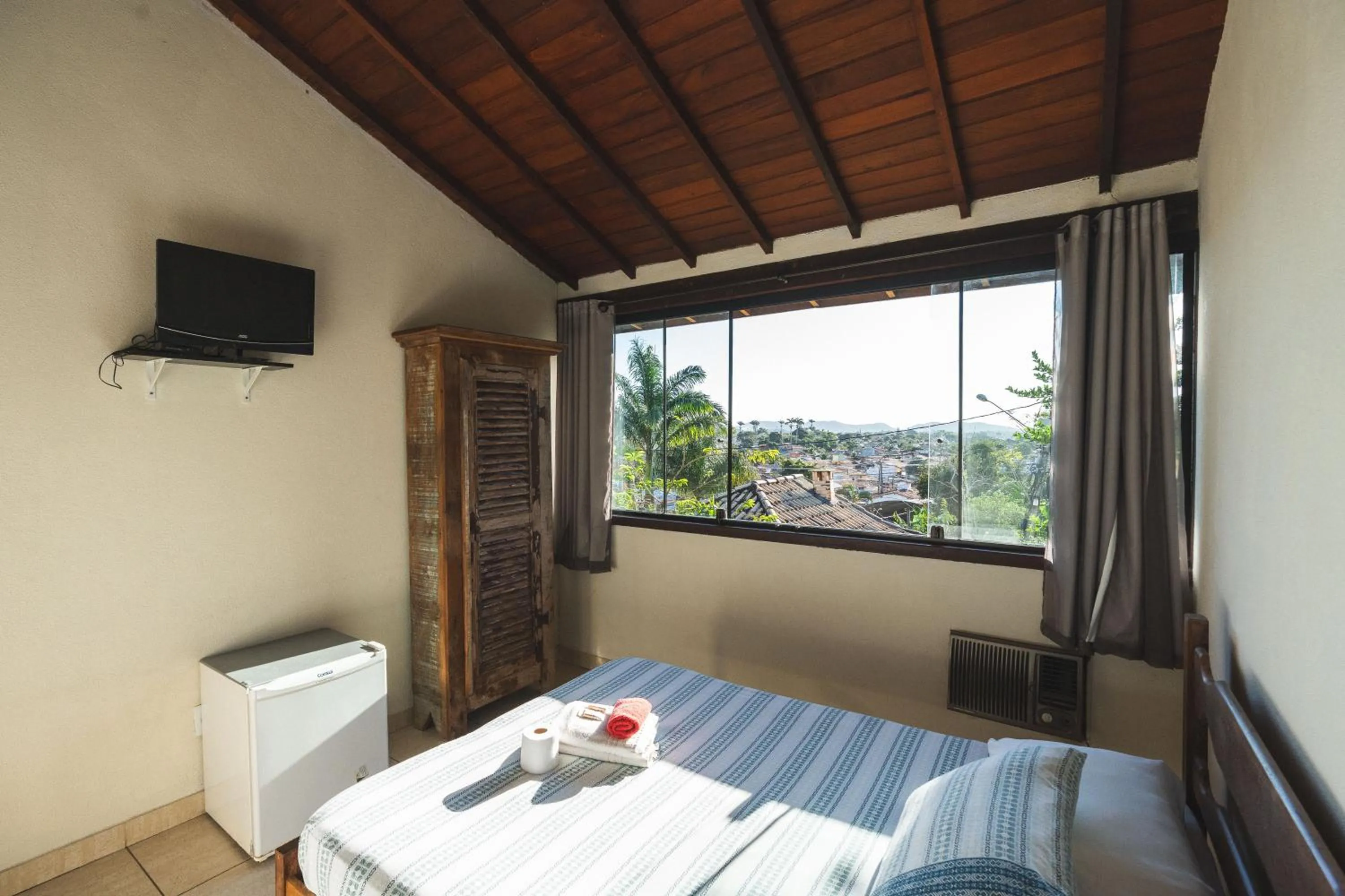 Bed in POUSADA ENCANTO DO AMOR