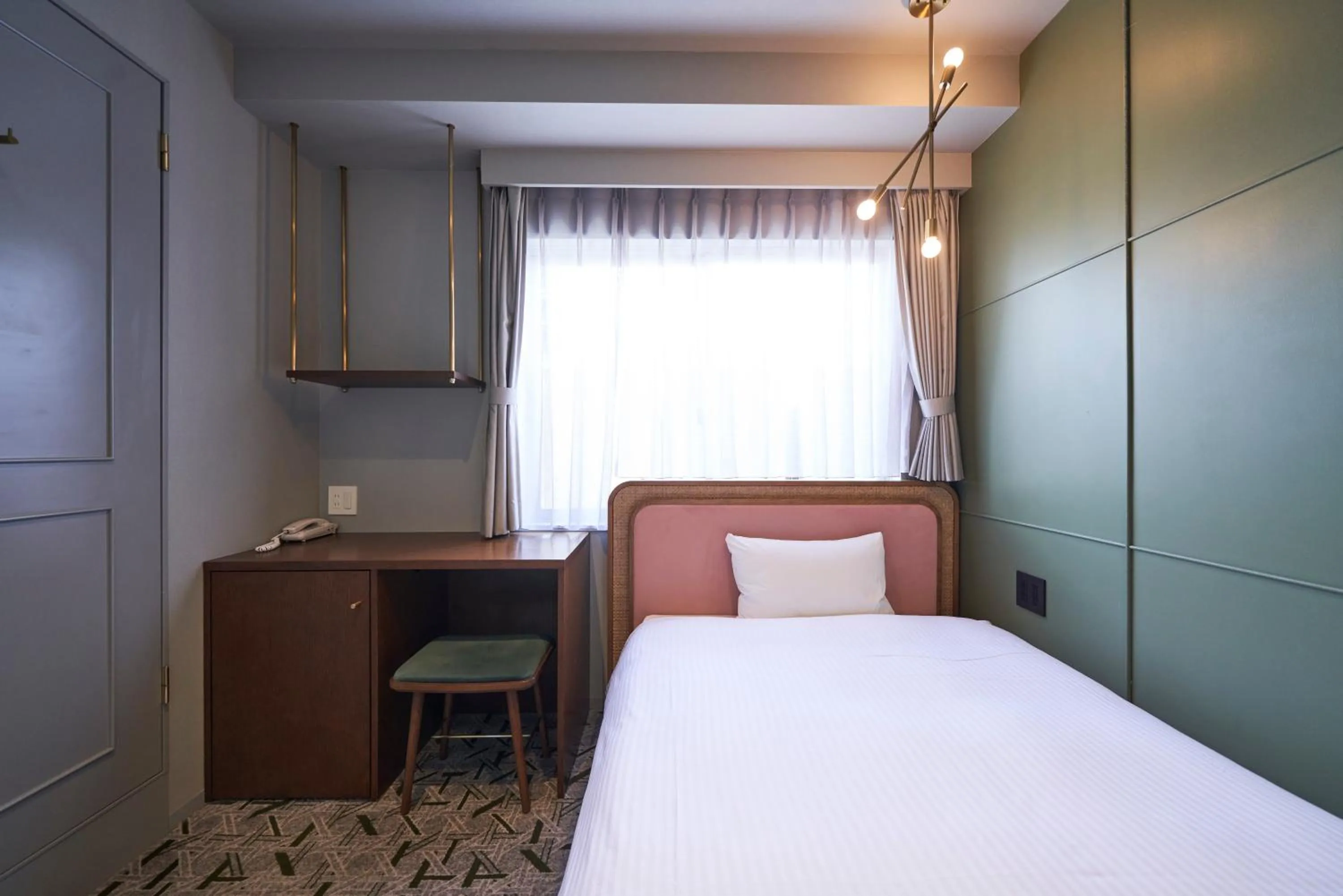 Bed in Mito Sannomaru Hotel