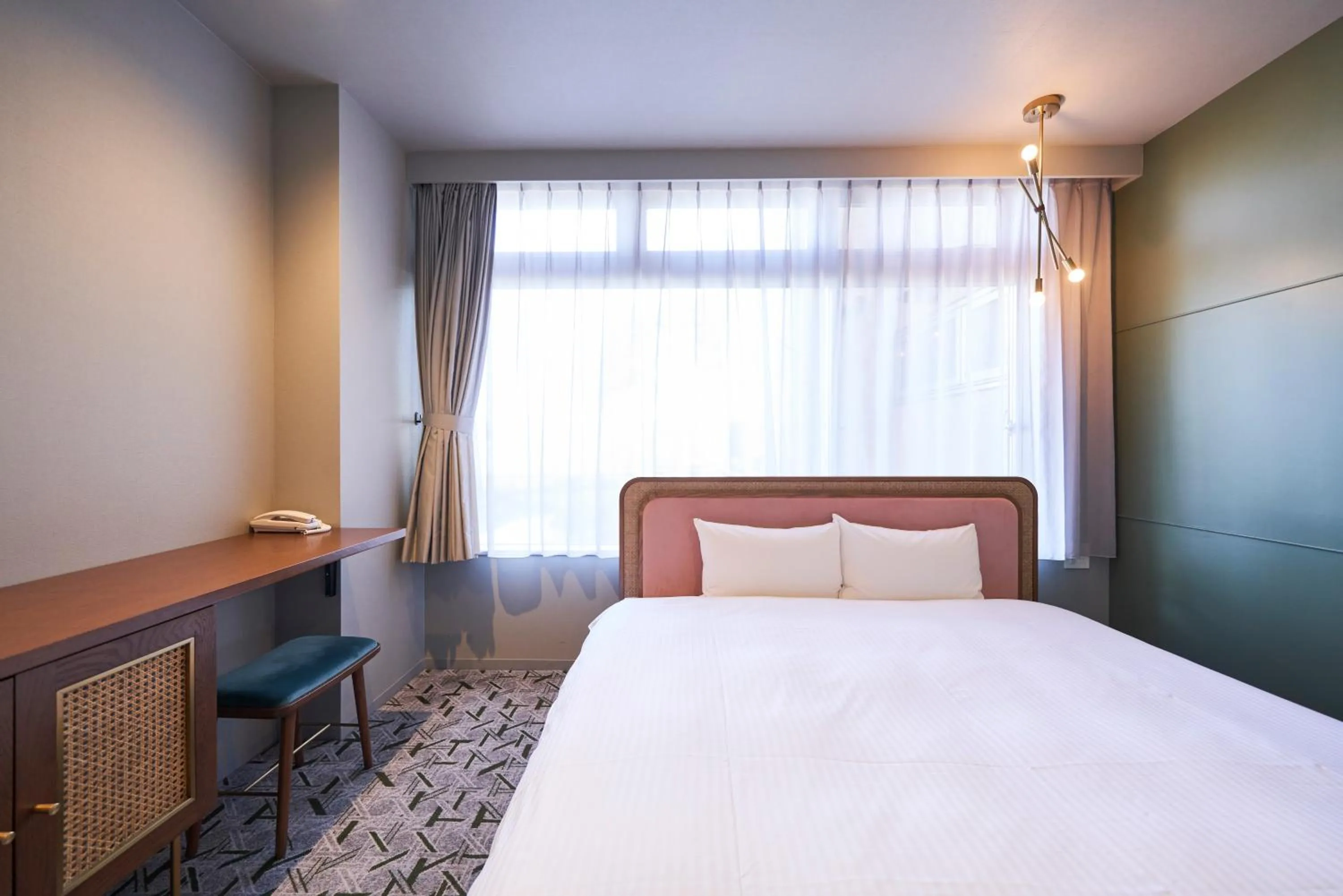 Bed in Mito Sannomaru Hotel