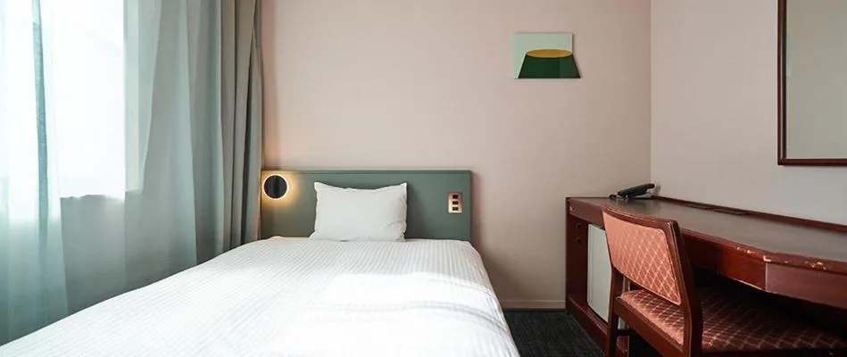 Bed in Saitama Grand Hotel Honjo