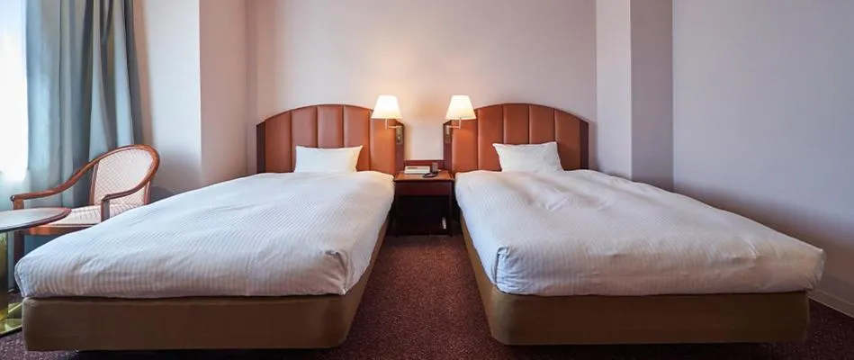 Bed in Saitama Grand Hotel Honjo