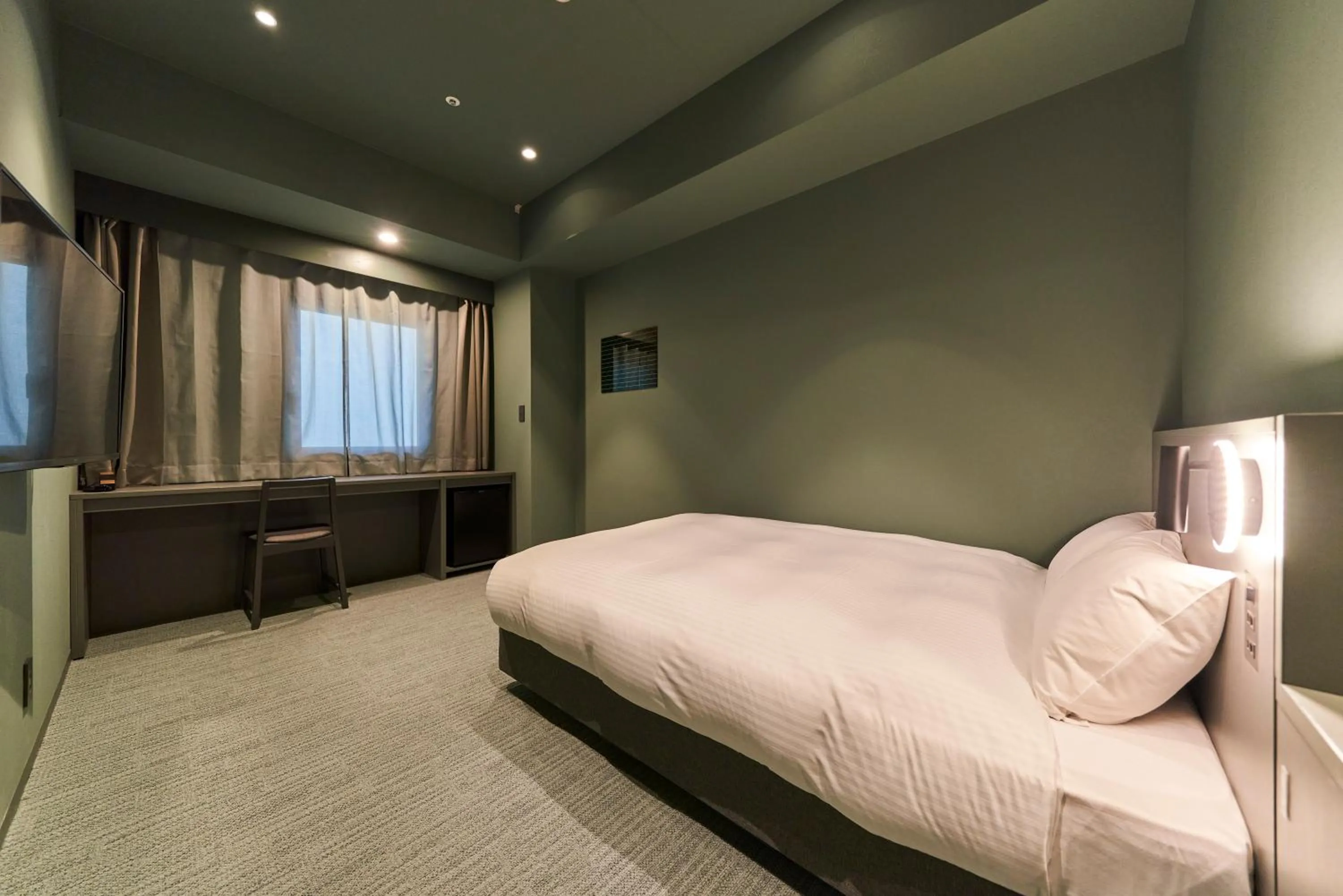 Bed in Saitama Grand Hotel Fukaya