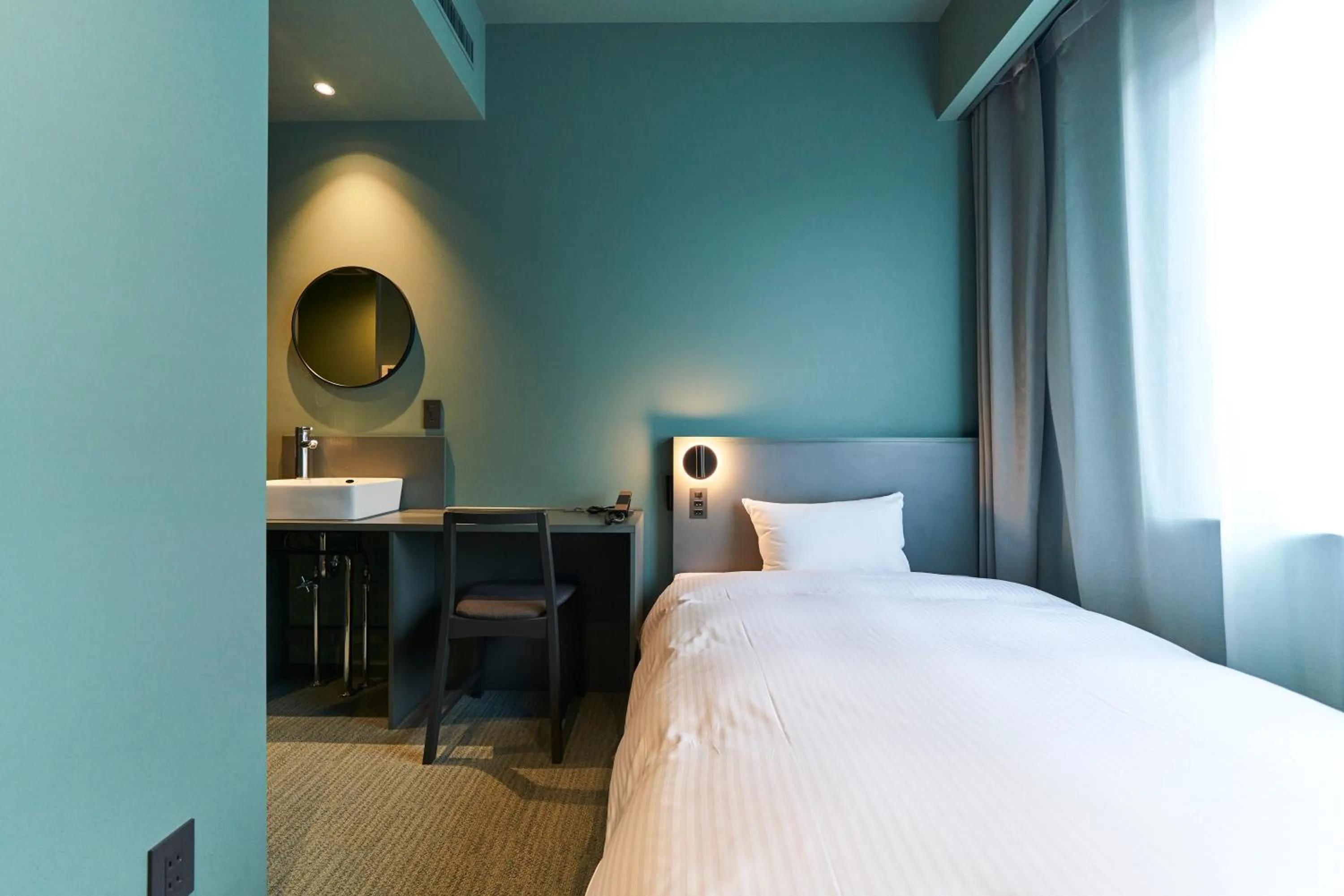 Bed in Saitama Grand Hotel Fukaya