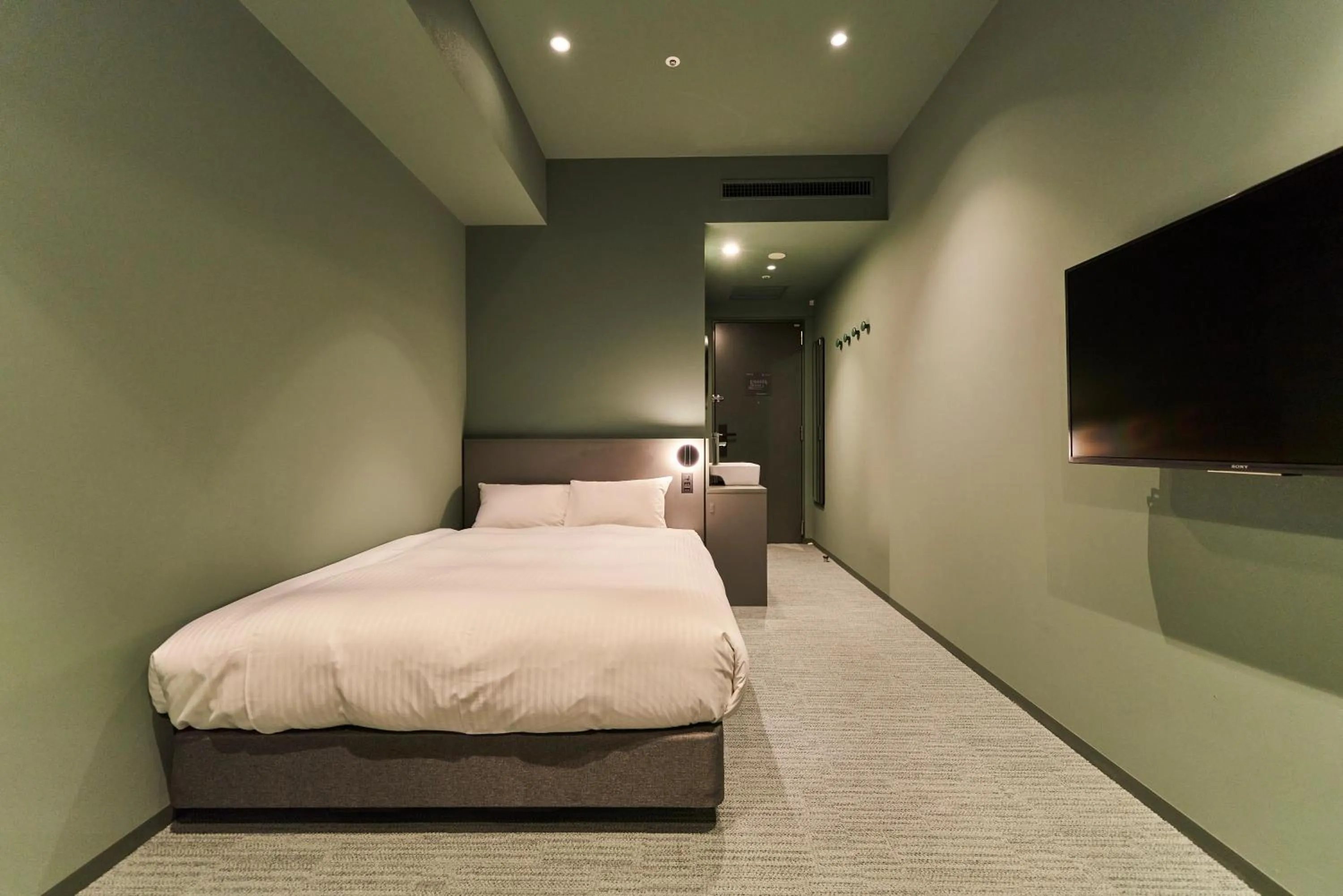 Bed in Saitama Grand Hotel Fukaya