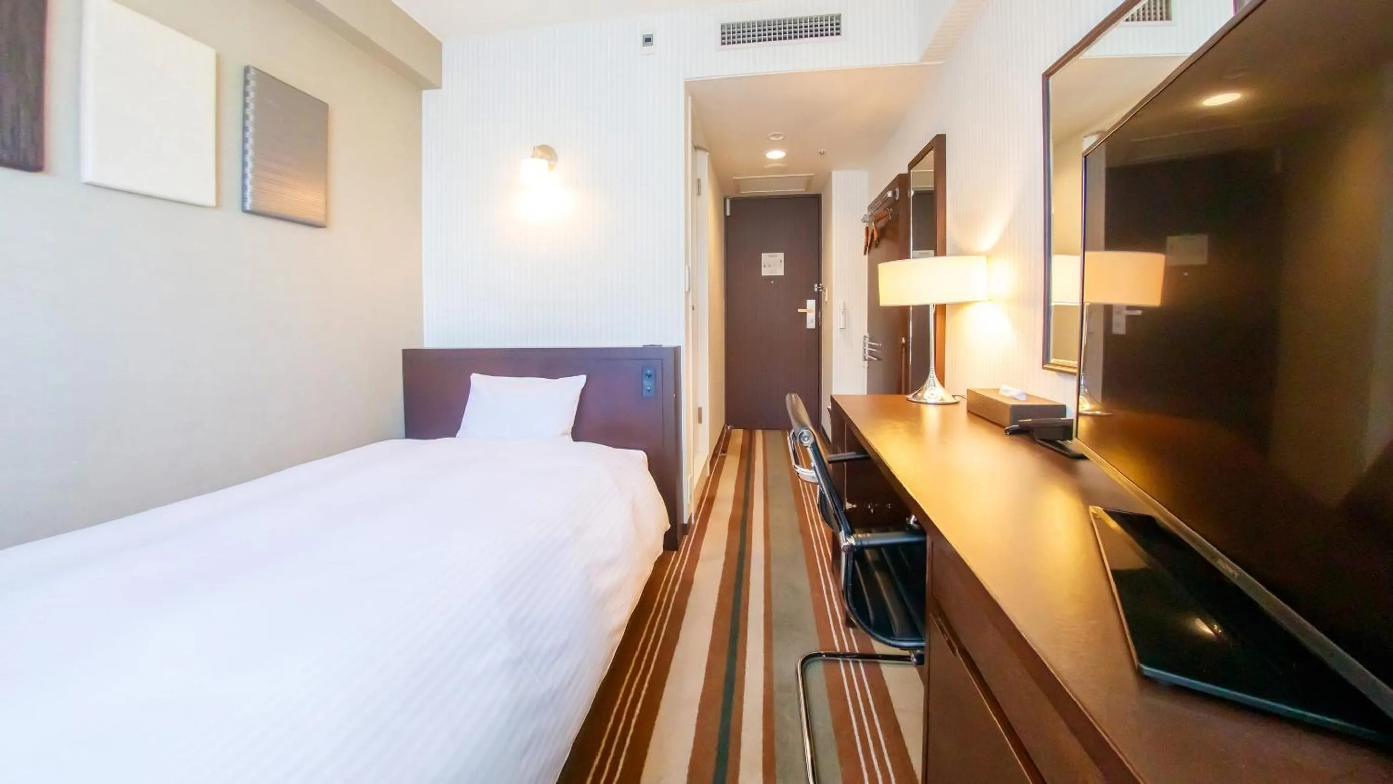Bed in Saitama Grand Hotel Fukaya