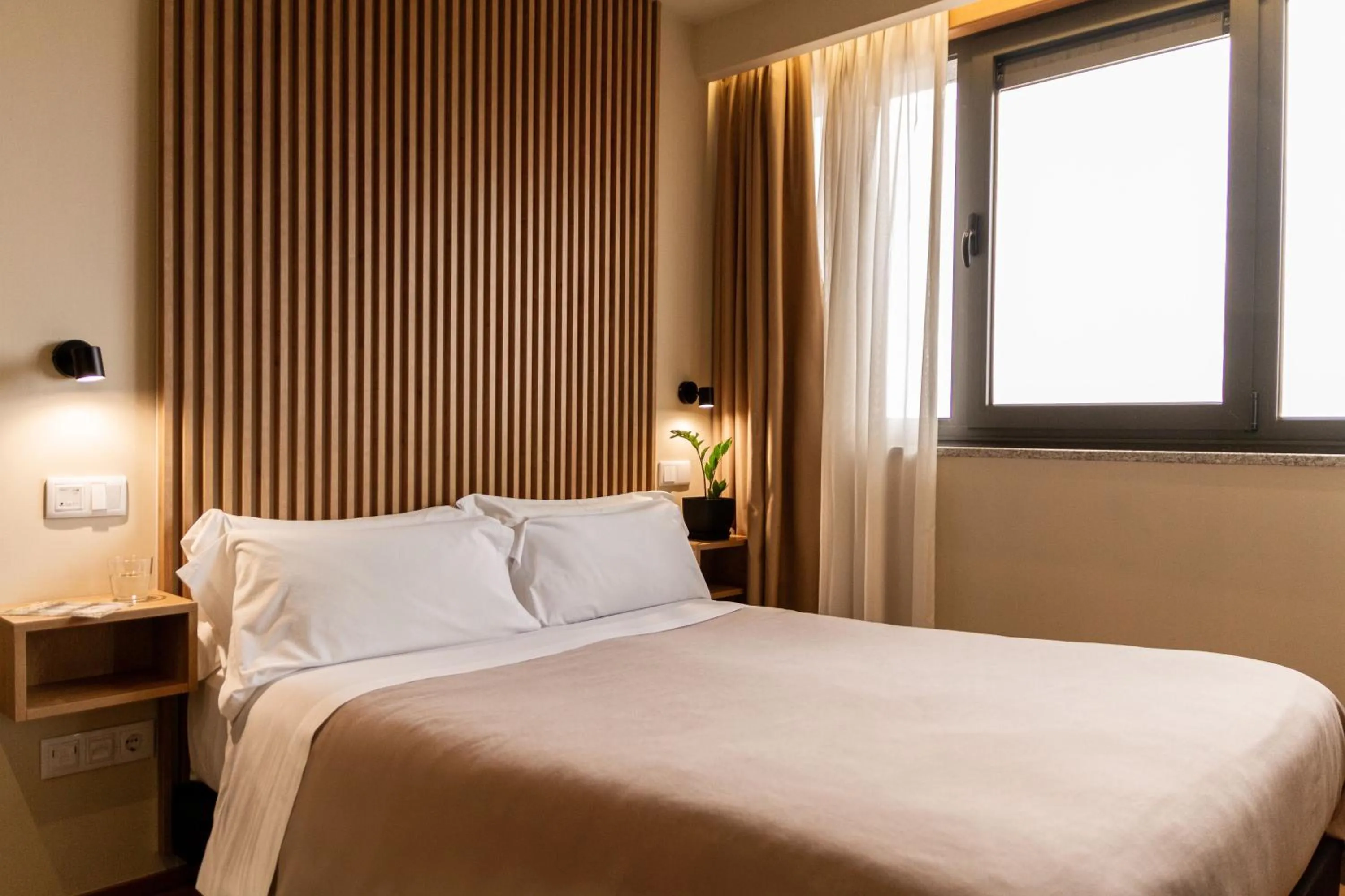 Bed in room Select Porto