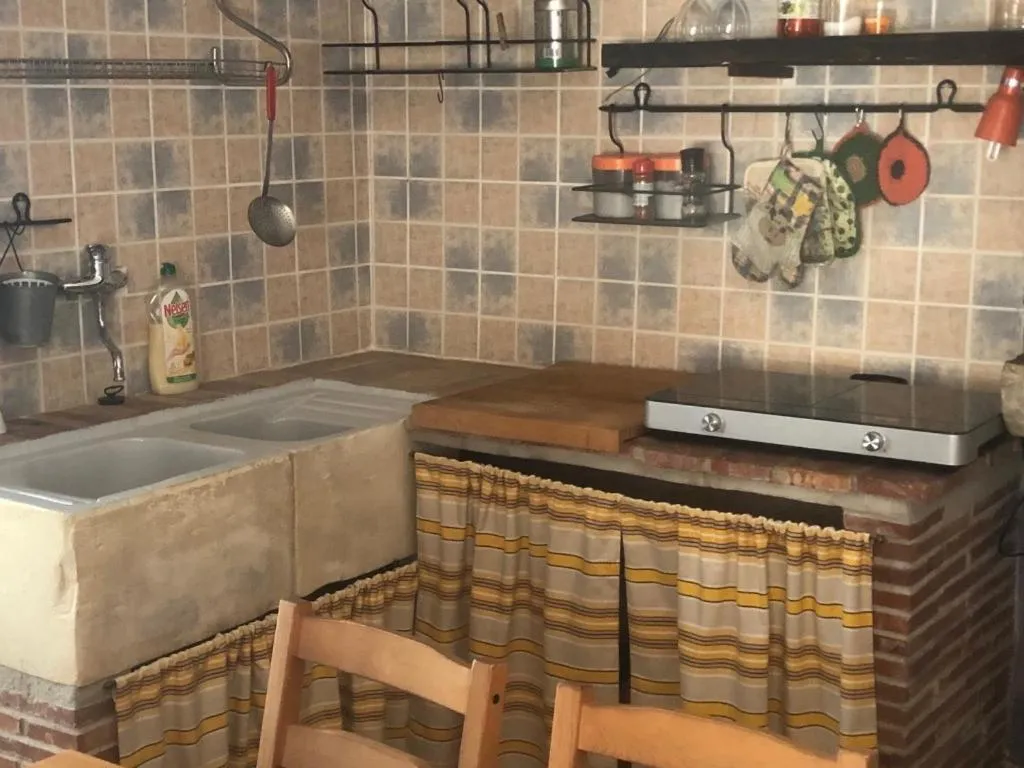 Kitchen or kitchenette in Il Favogoloso