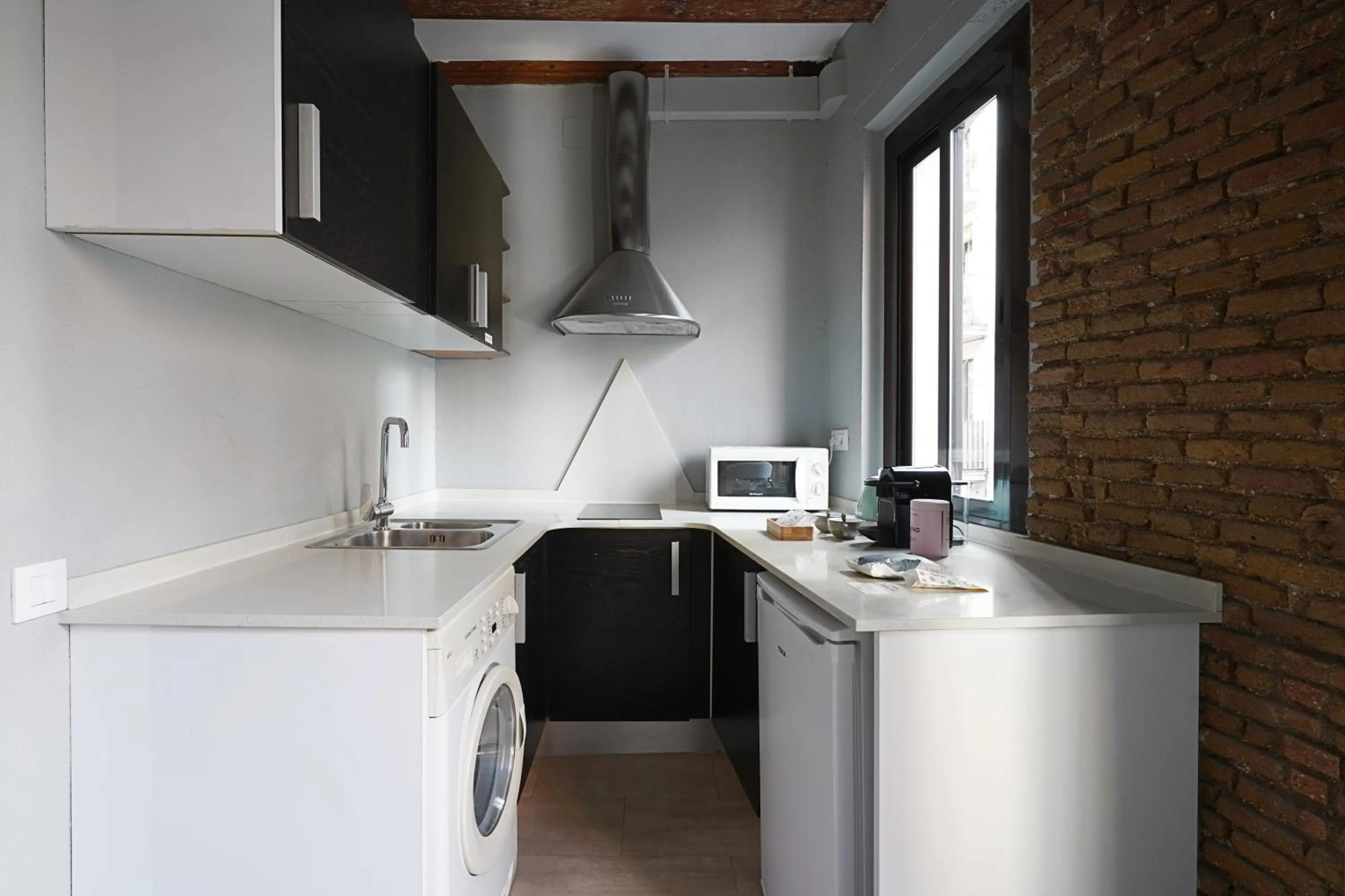 Kitchen or kitchenette in Numa Barcelona Lustre