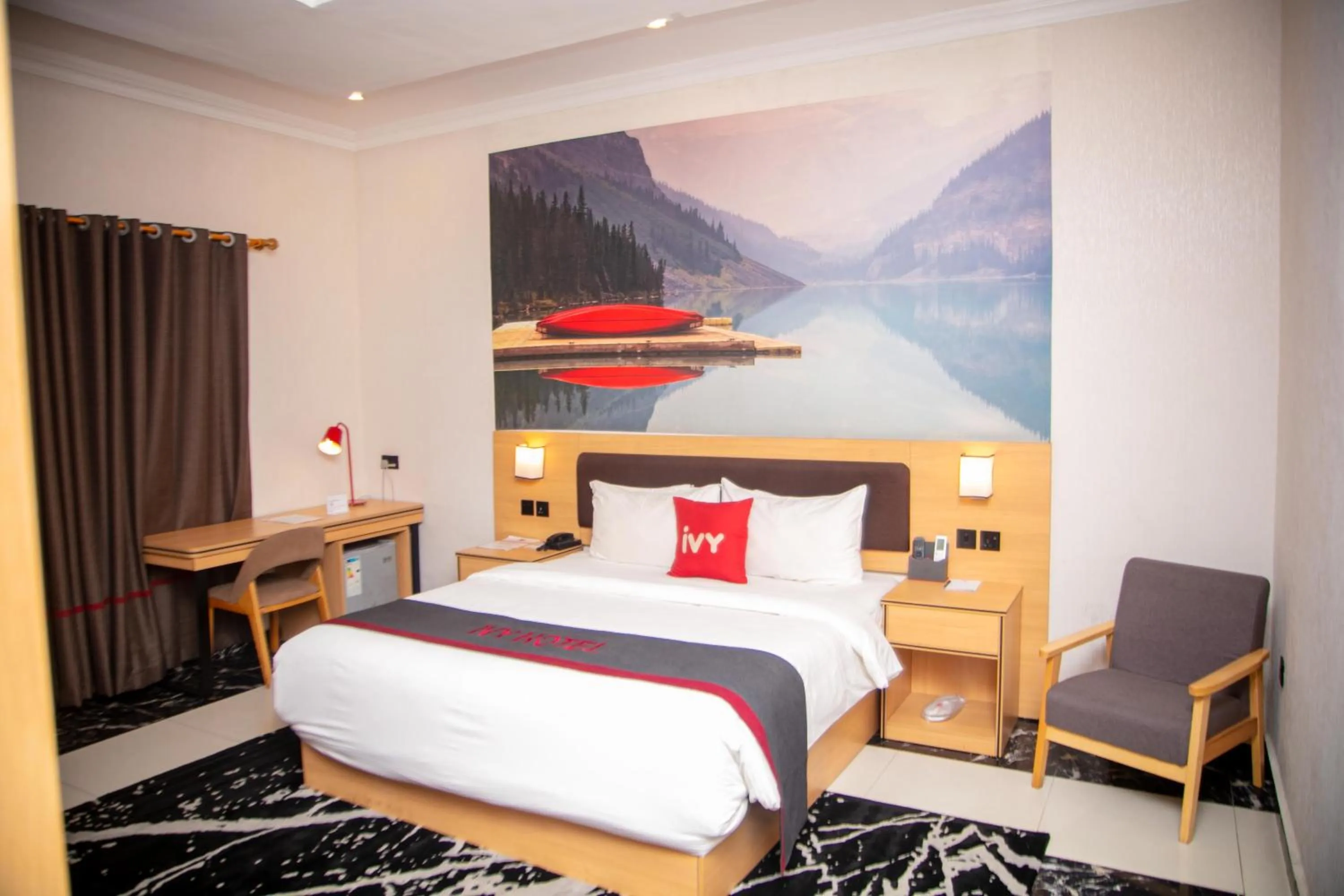 Bed in Ivy Hotel Emerald