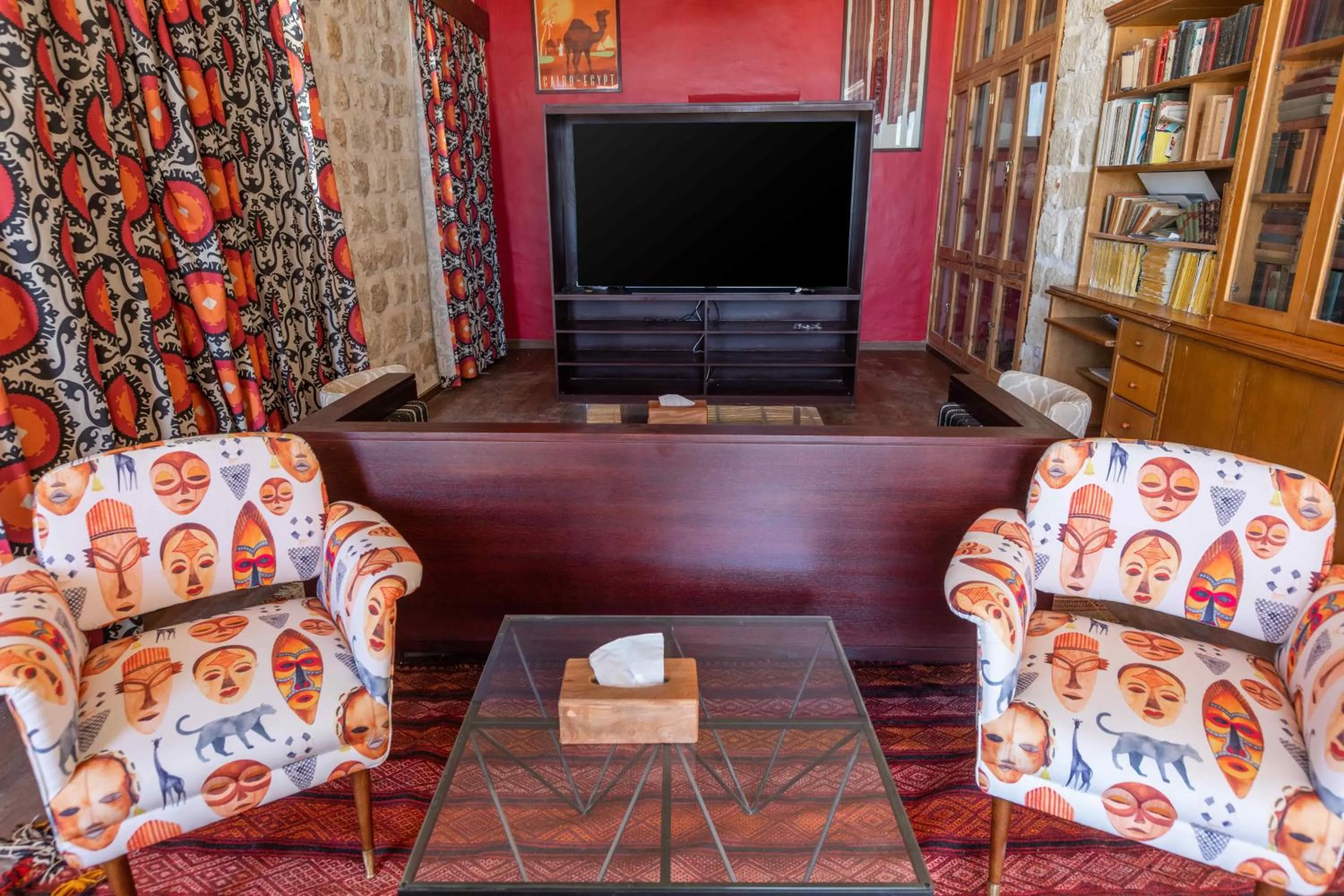 Communal lounge/ TV room in Wadi Sabarah Lodge