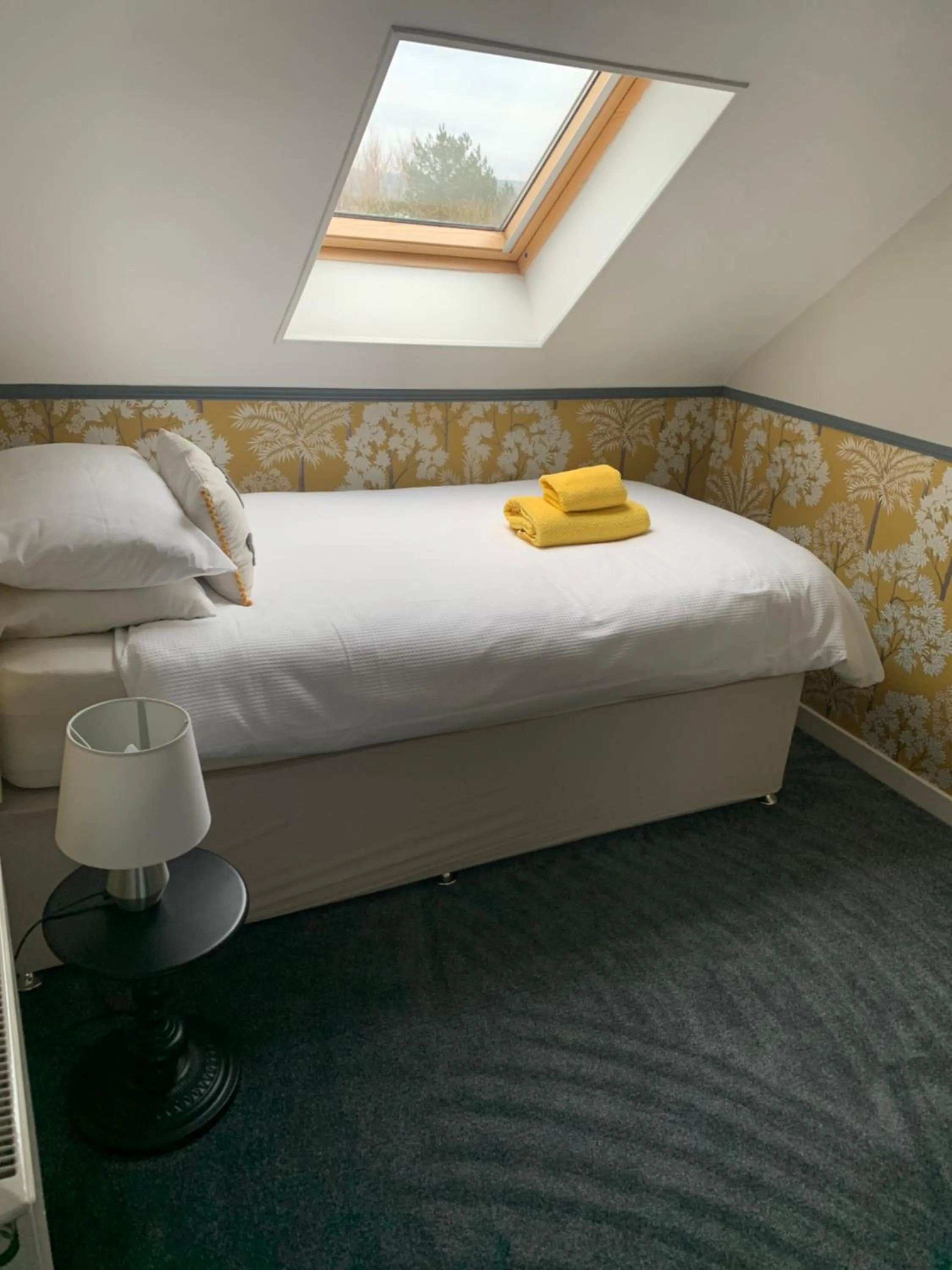 Bed in Neptunes Rest Guest Hotel