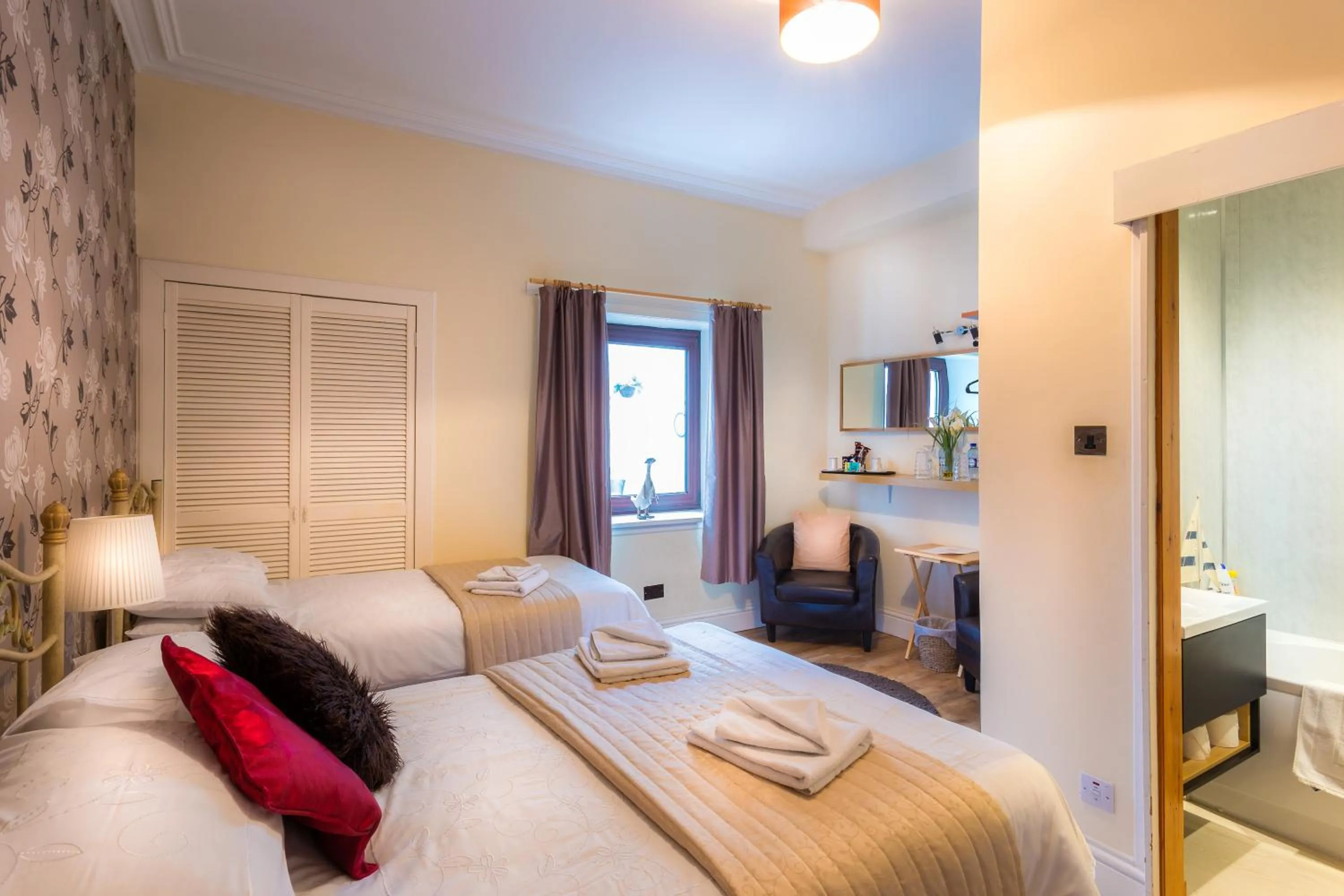 Bed in Neptunes Rest Guest Hotel