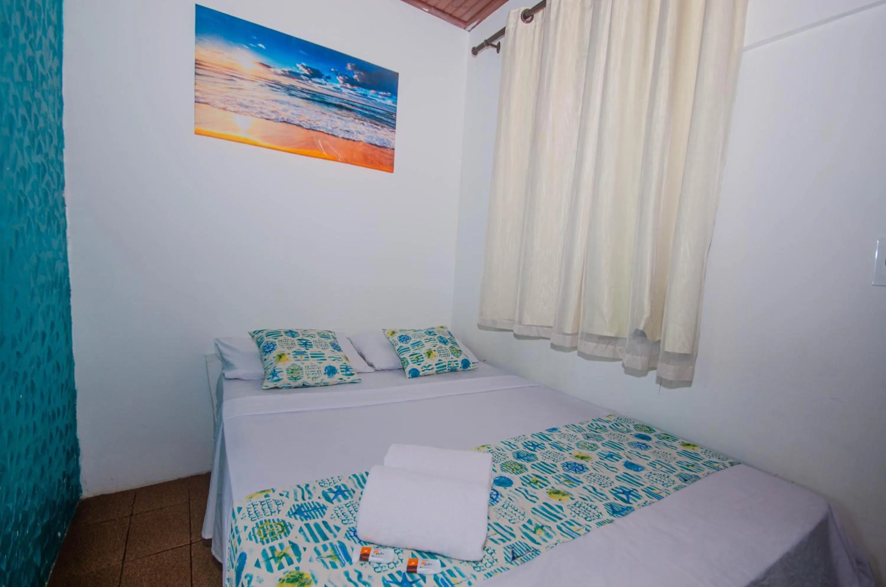 Bed in Pousada Natal