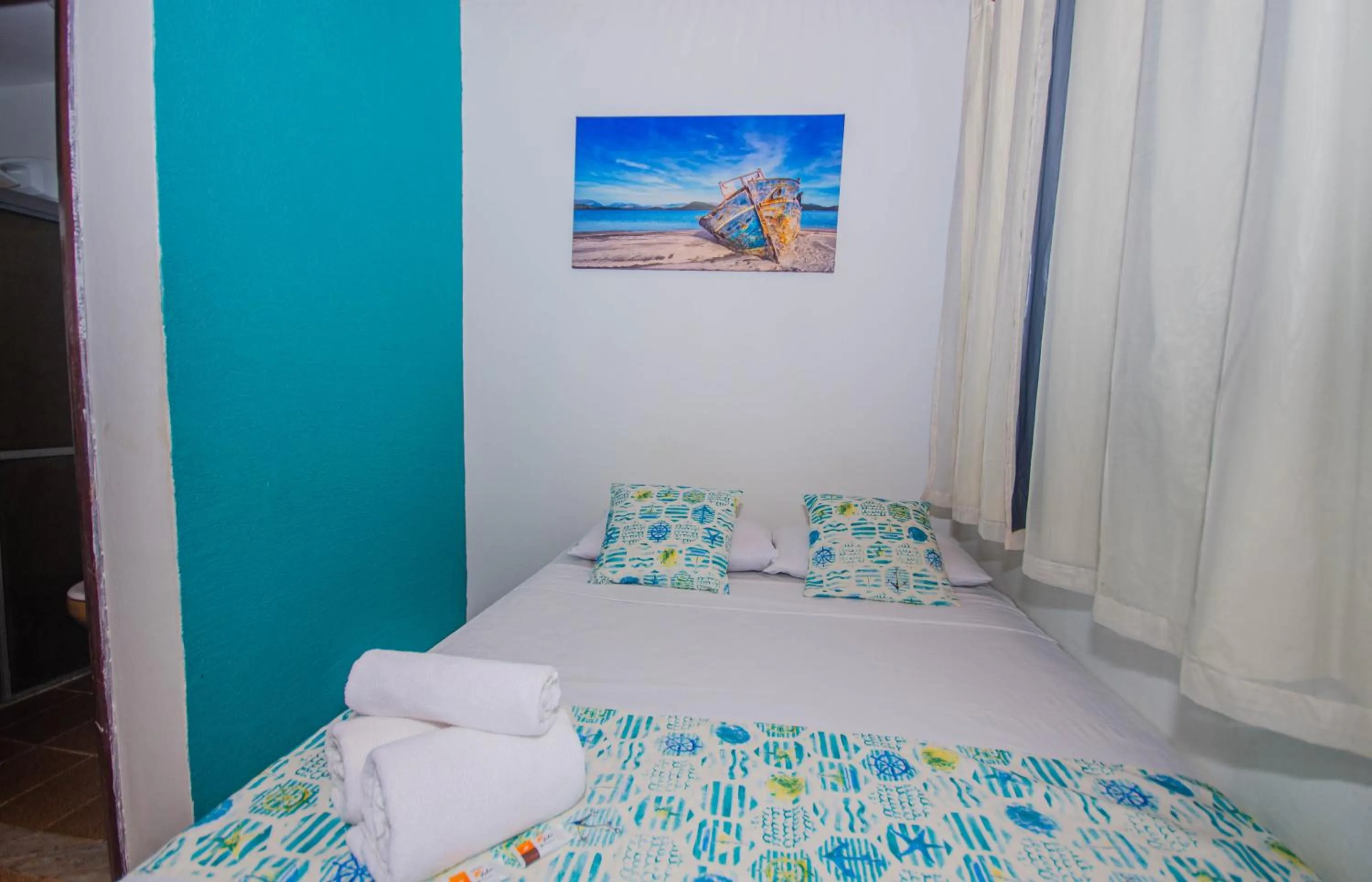 Photo of the whole room, Bed in Pousada Natal