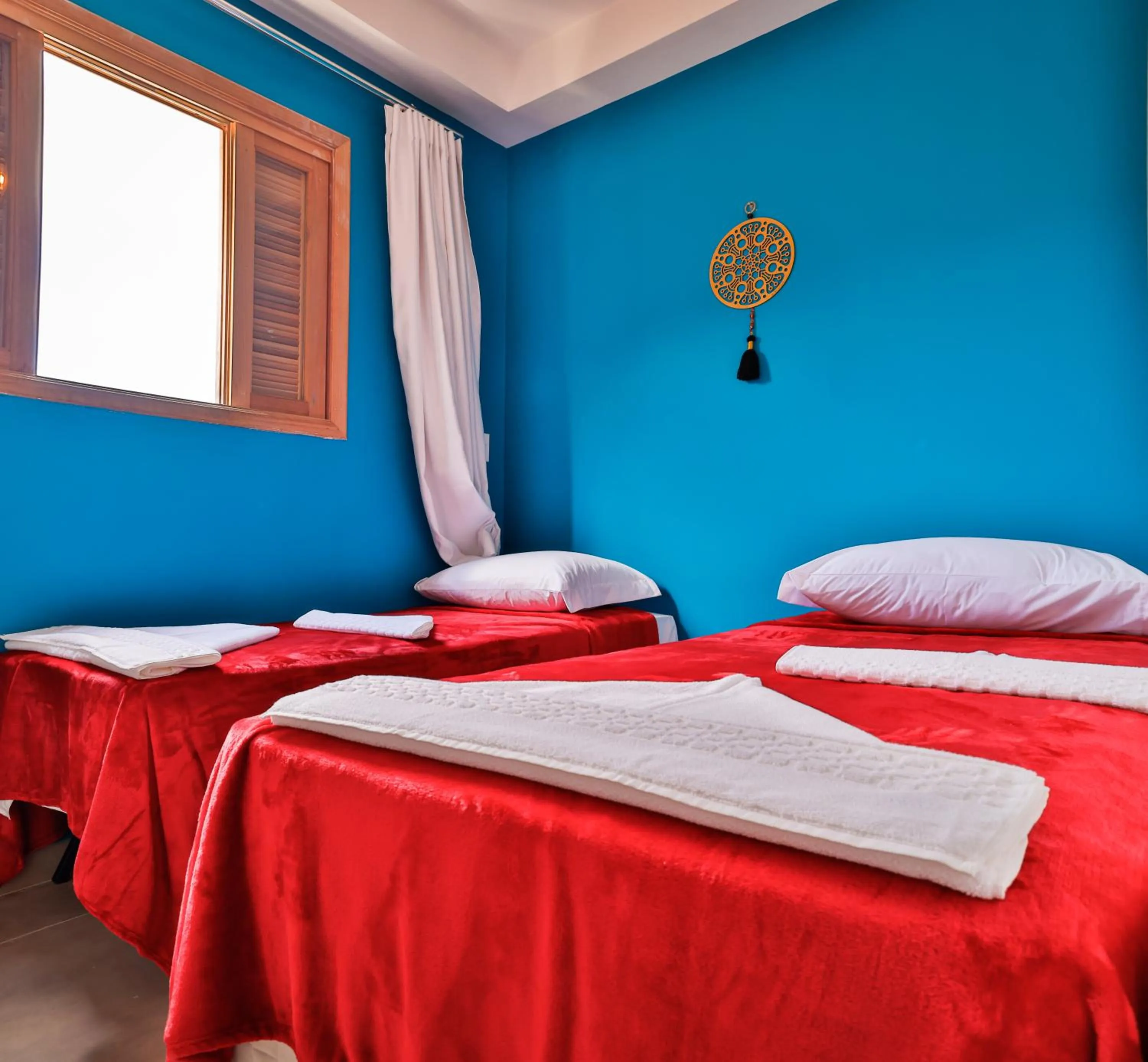 Bed in Mandala Beach Hotel