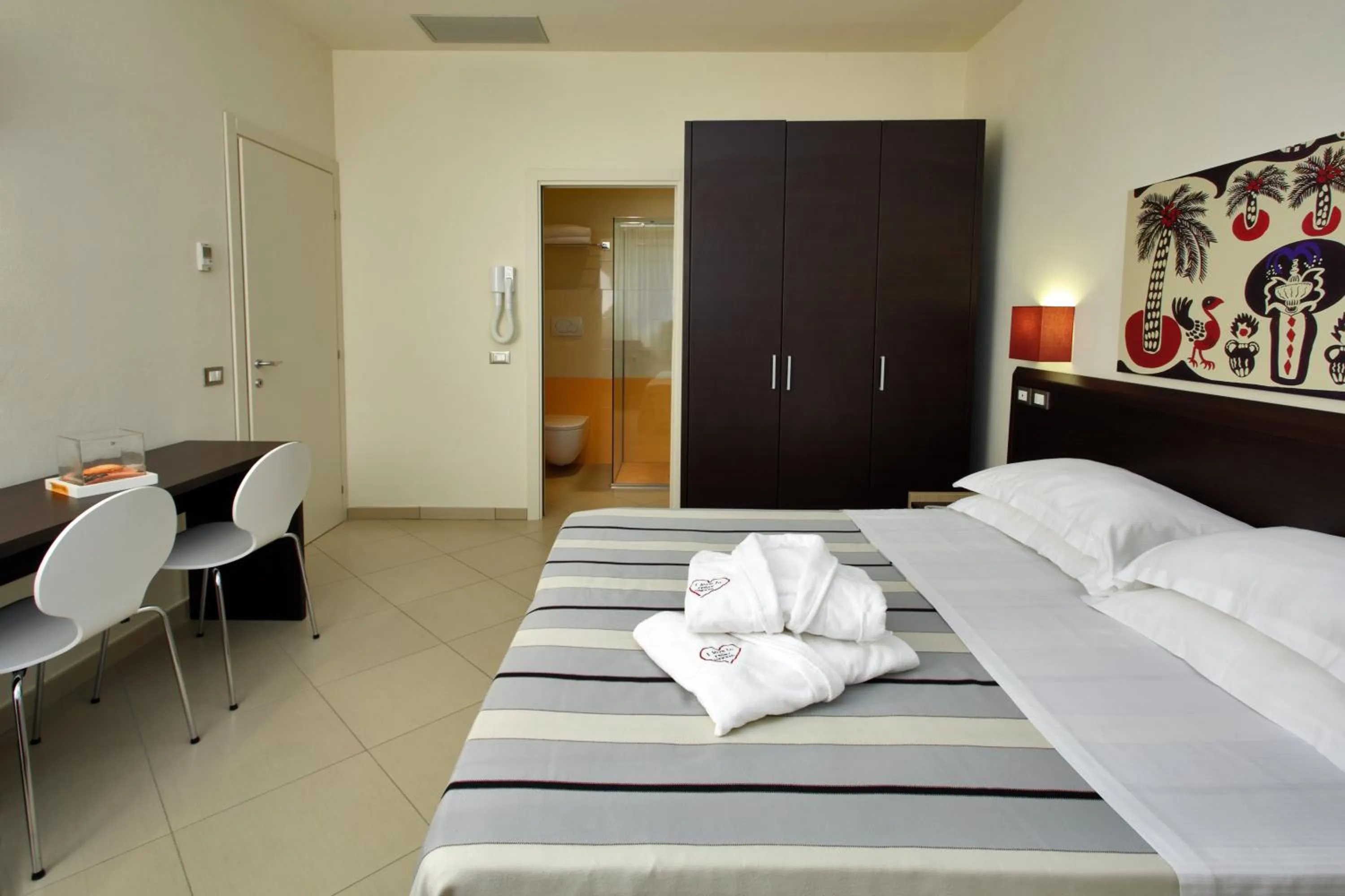 Decorative detail, Bed in Noha Suite Hotel