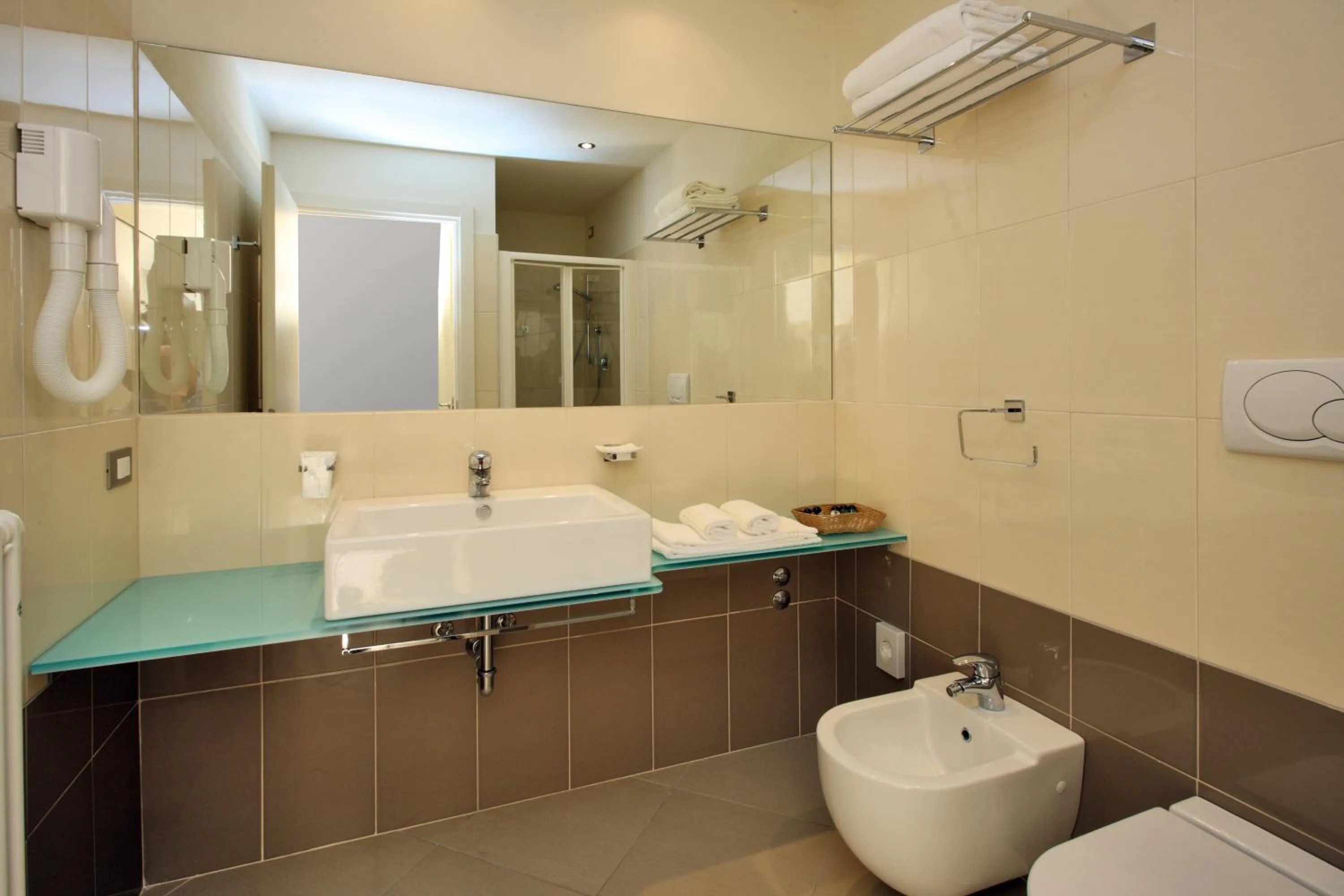 Bathroom in Noha Suite Hotel