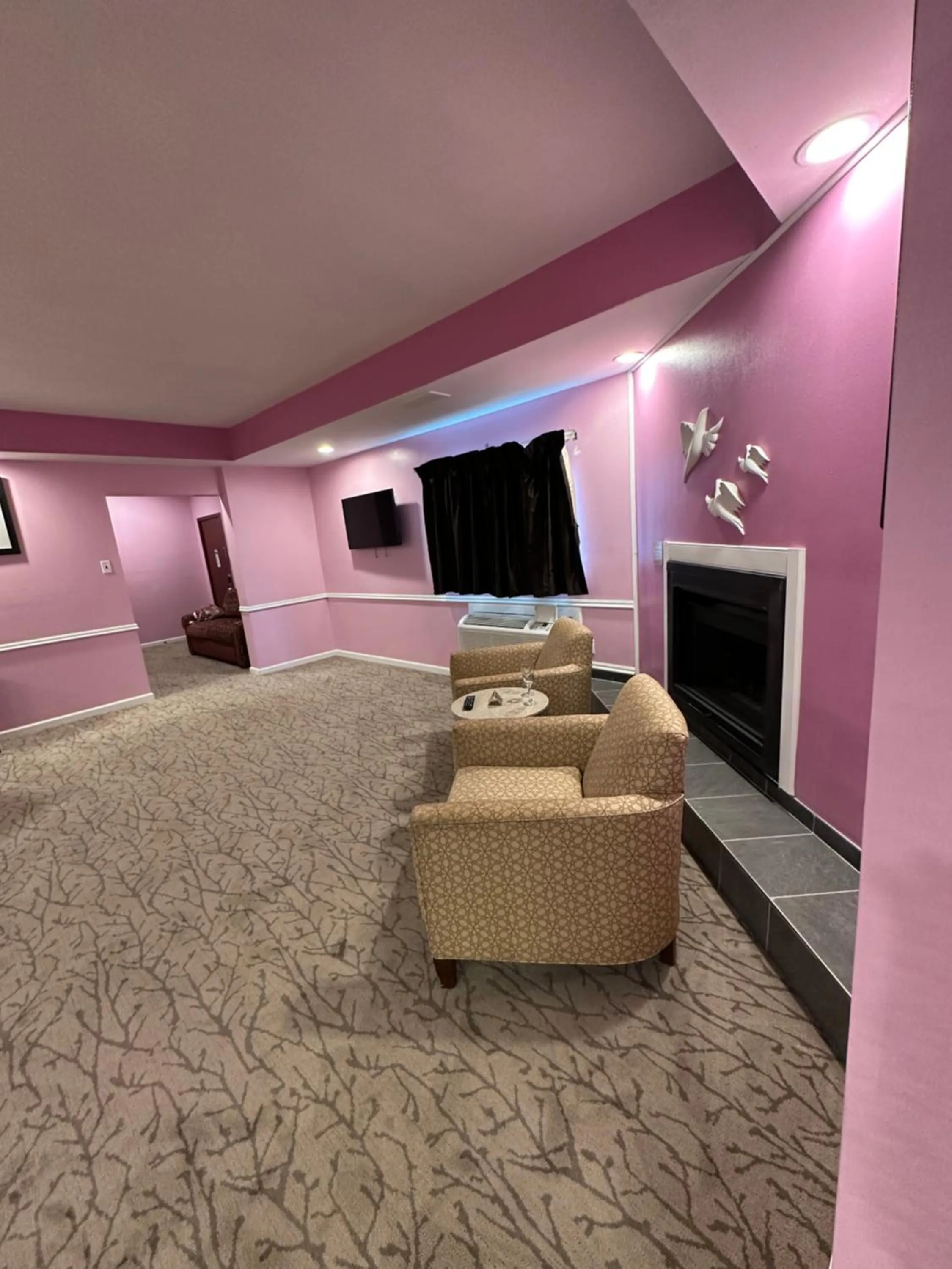 Seating area in Inn of the Dove - Romantic Luxury Suites with Jacuzzi & Seasonal Fireplace at Harrisburg-Hershey-Philadelphia, PA