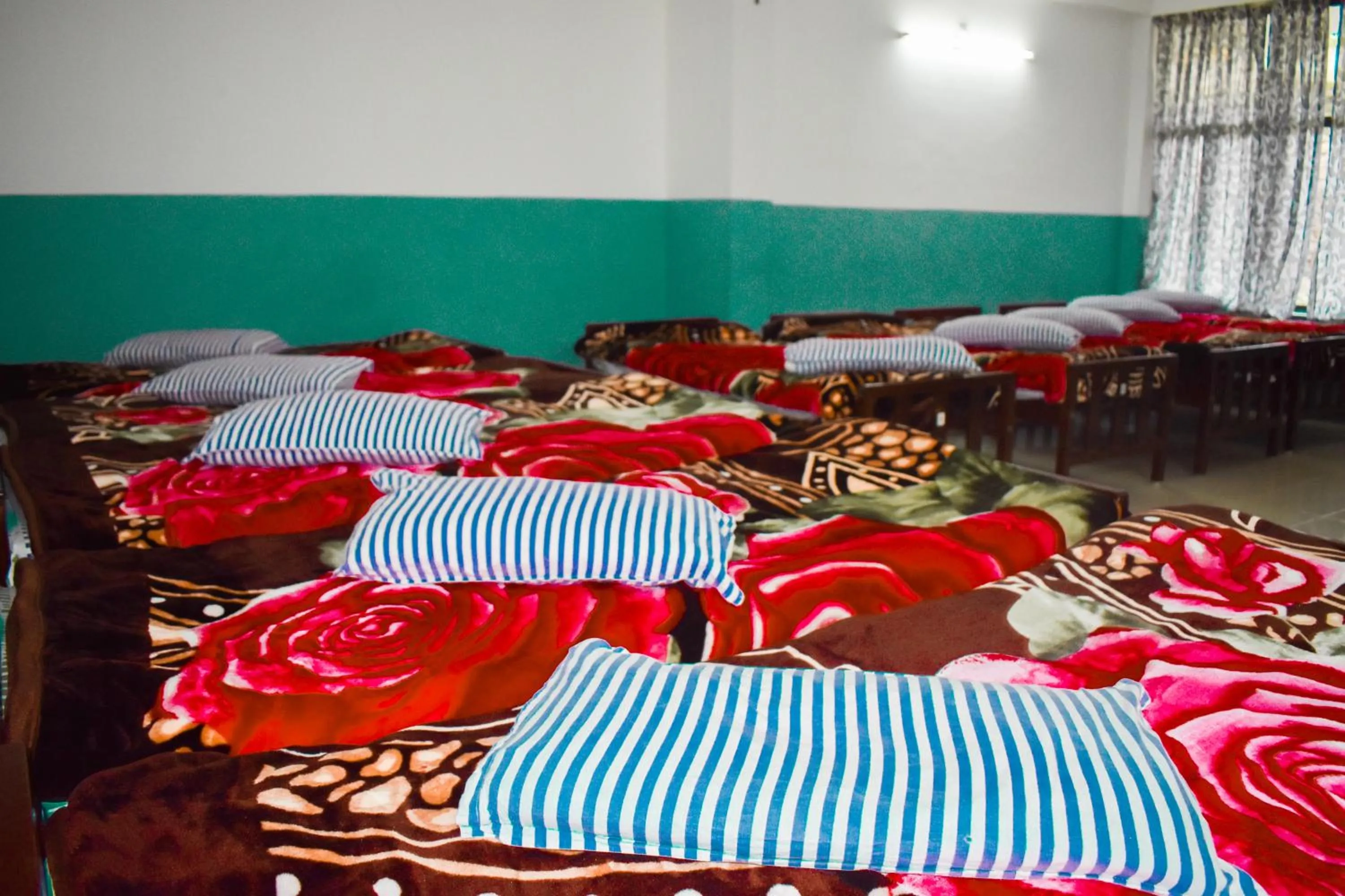 Photo of the whole room, Bed in AC MIST