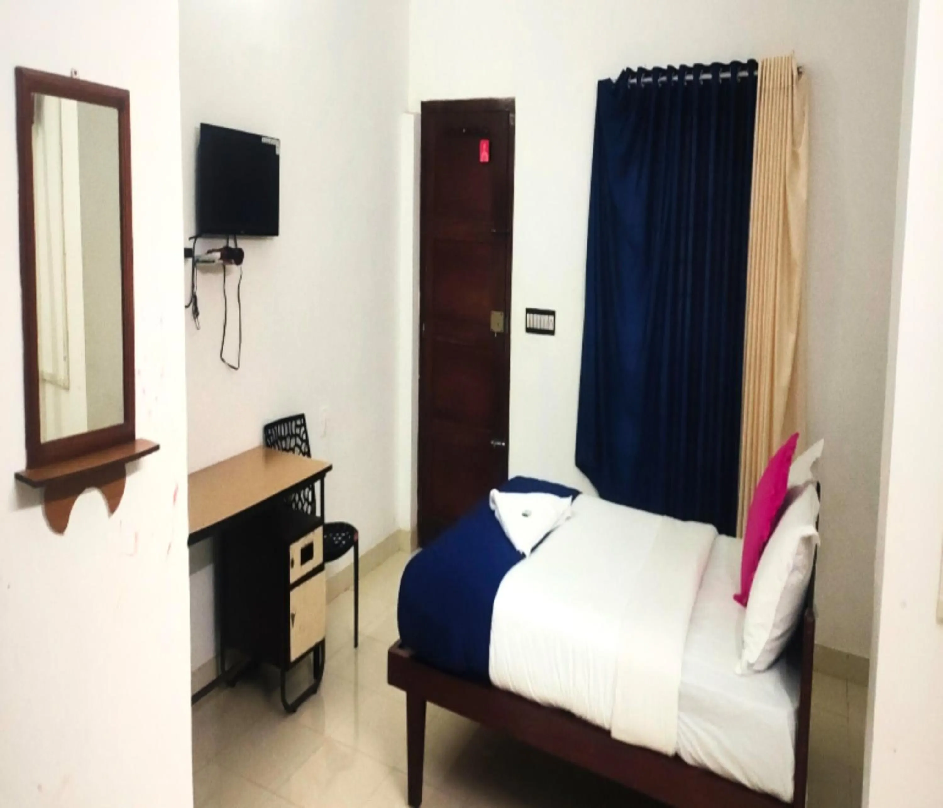 Photo of the whole room, Bed in AC MIST