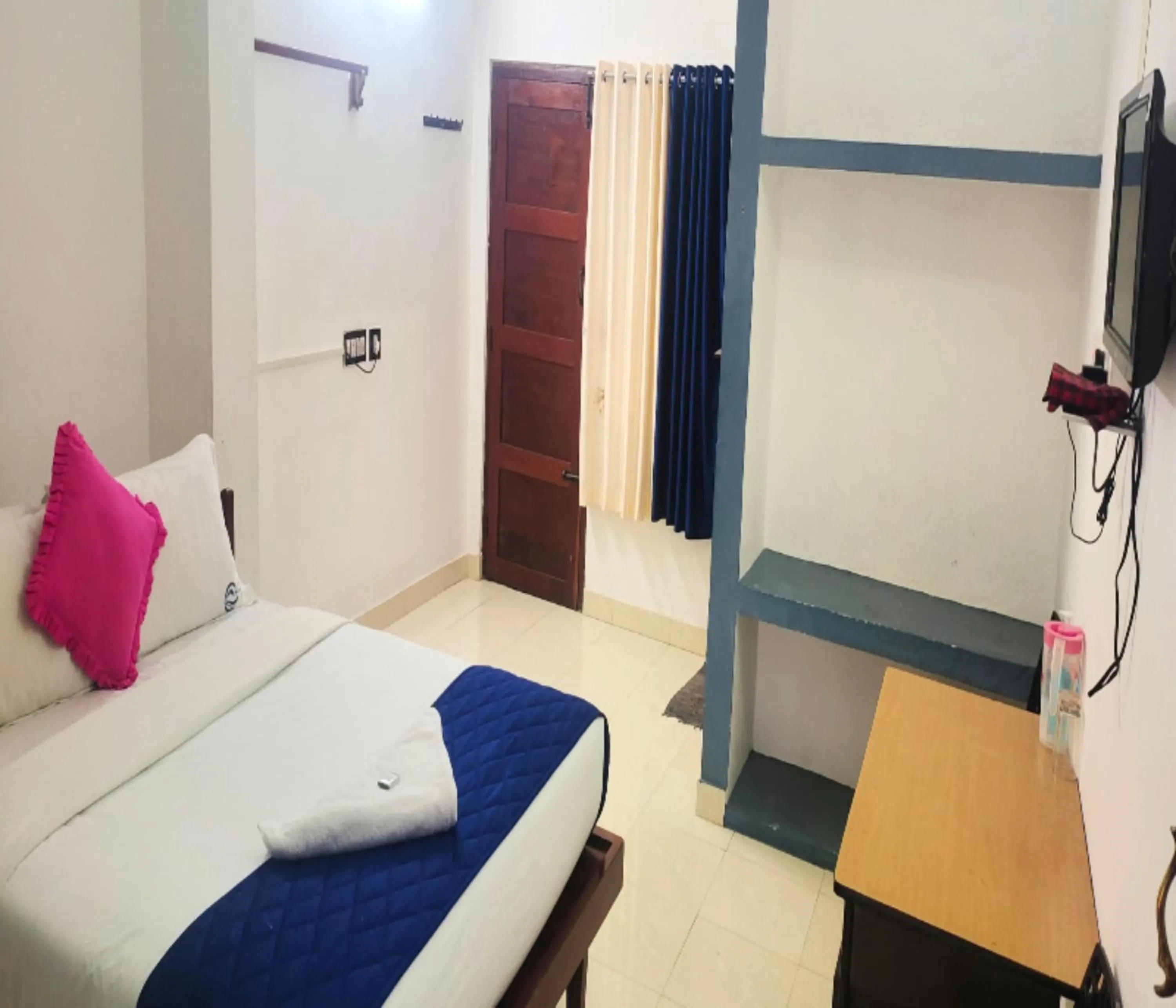 Photo of the whole room, Bed in AC MIST