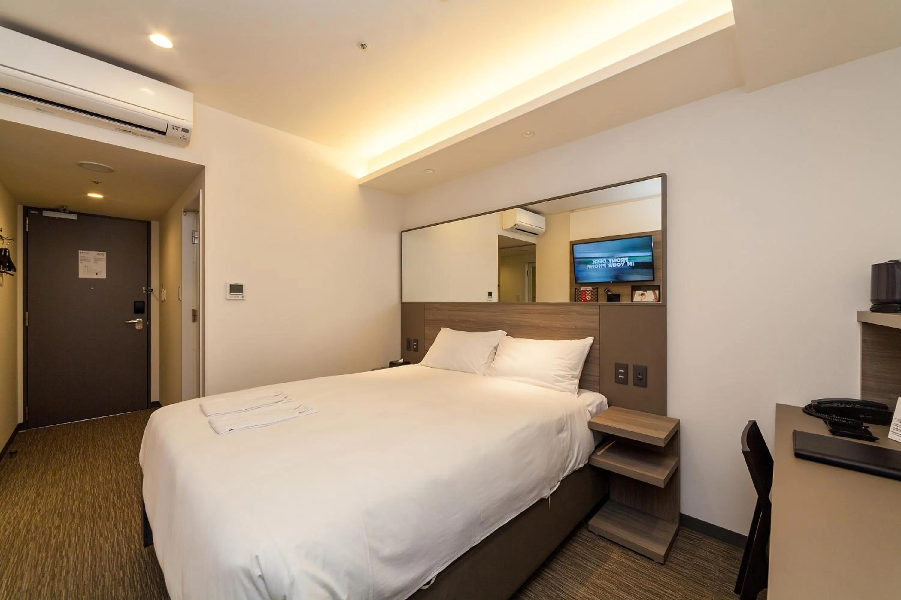 Photo of the whole room, Bed in Smile Hotel Hiroshima