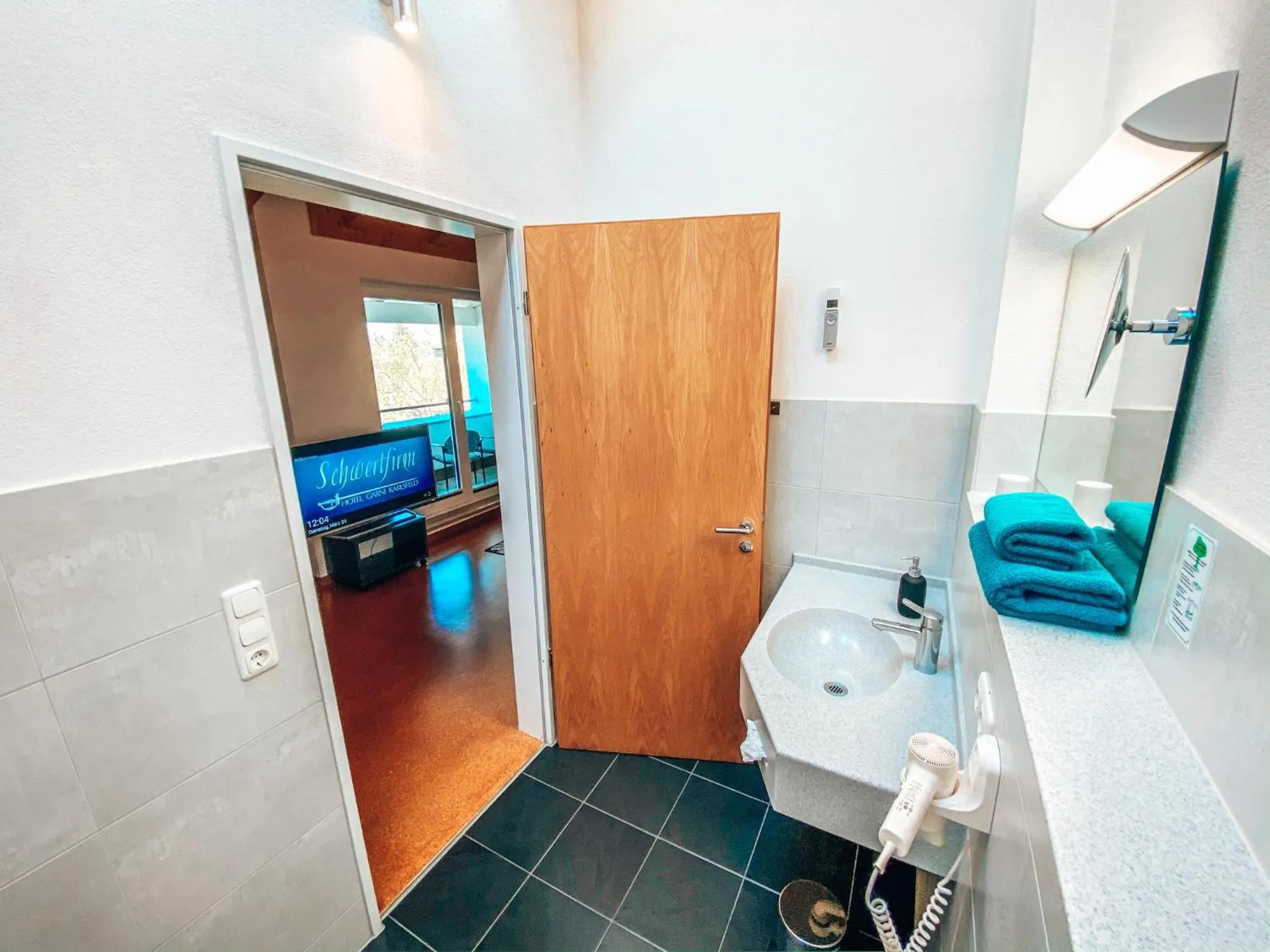 Bathroom, Bed in Hotel Schwertfirm