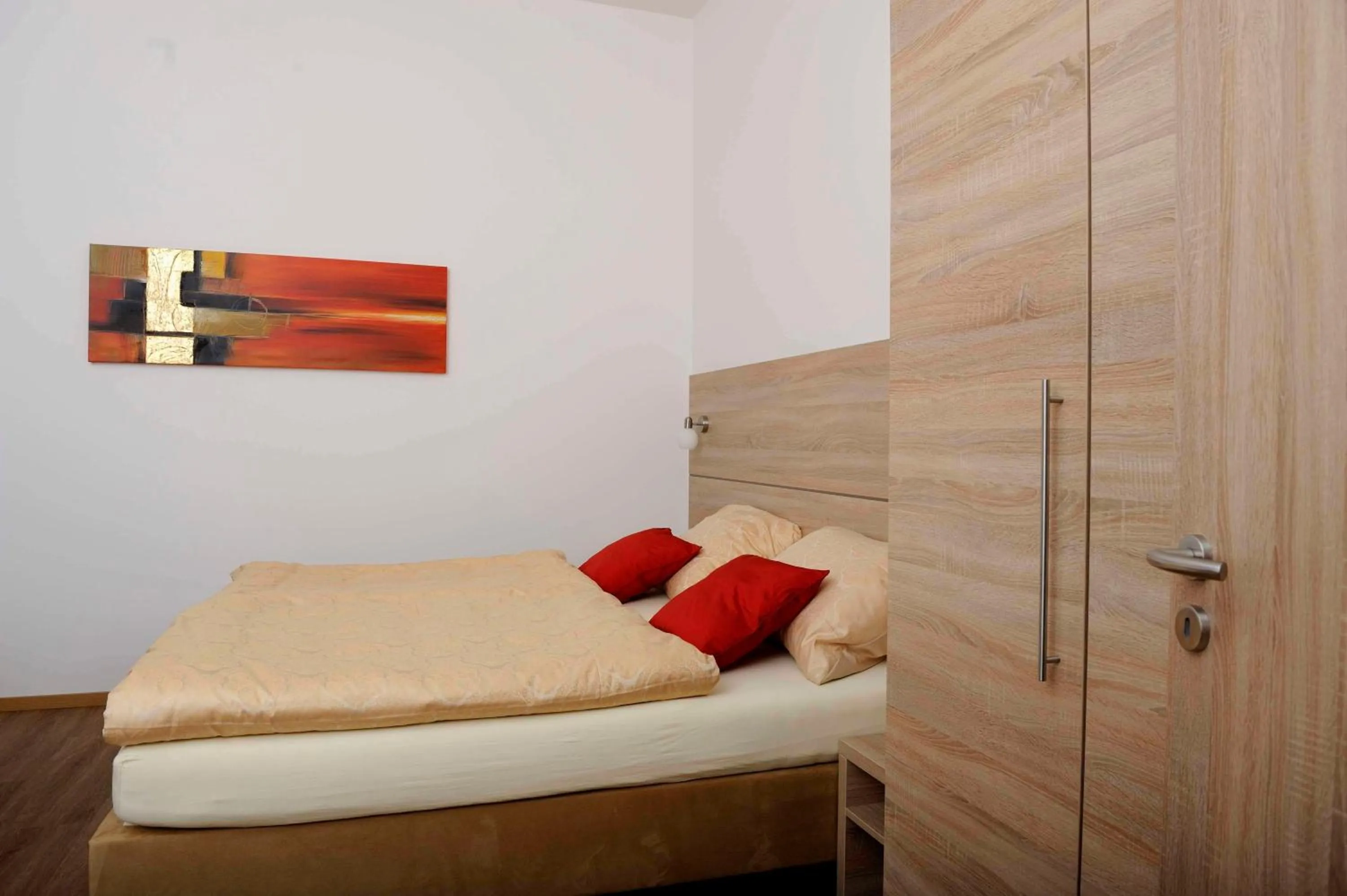 Bed in Das Falk Apartmenthaus