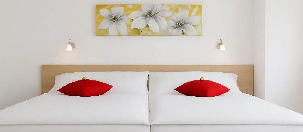 Bed in Das Falk Apartmenthaus