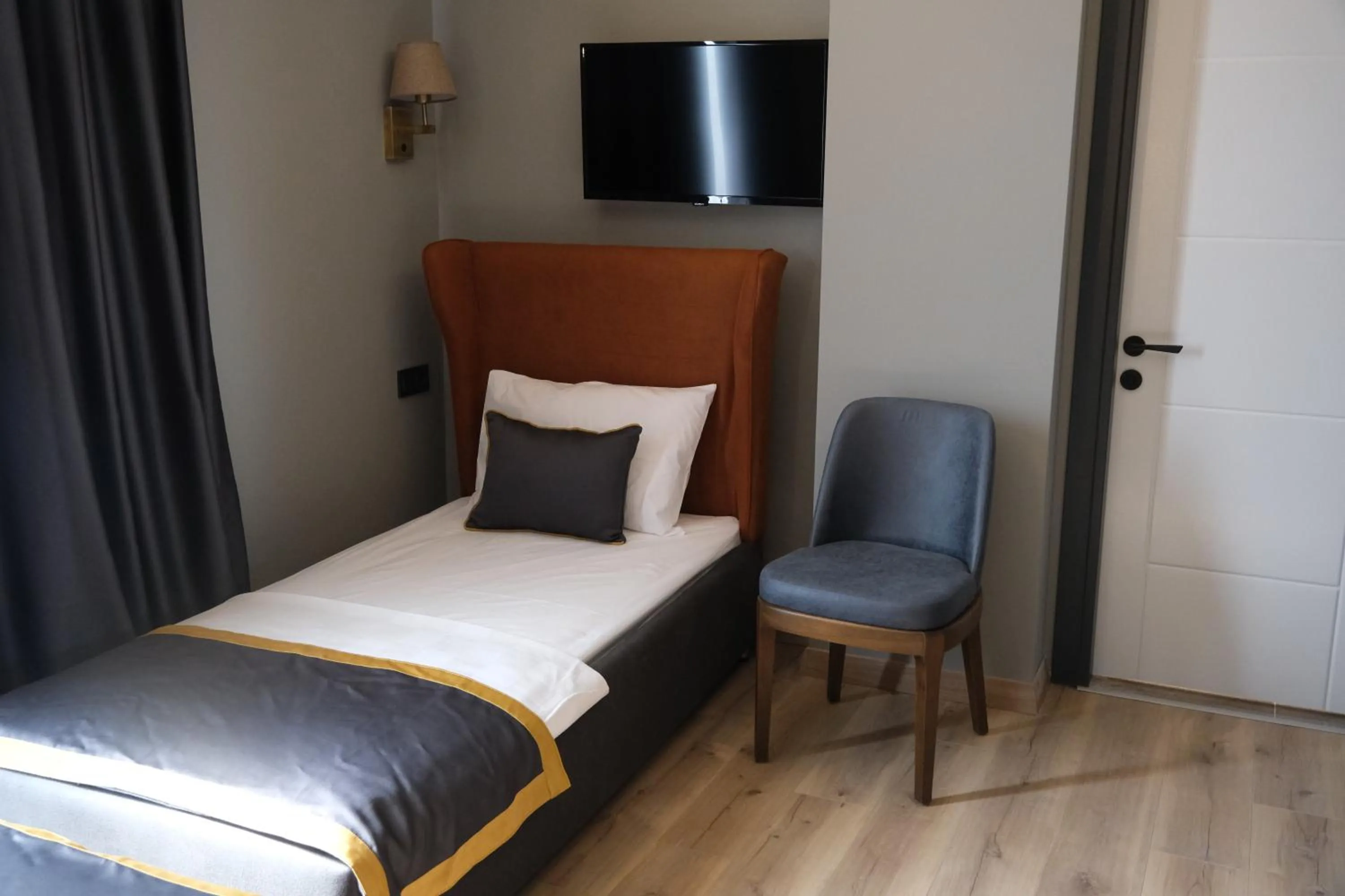 Bed in The Pearl Airport Hotel