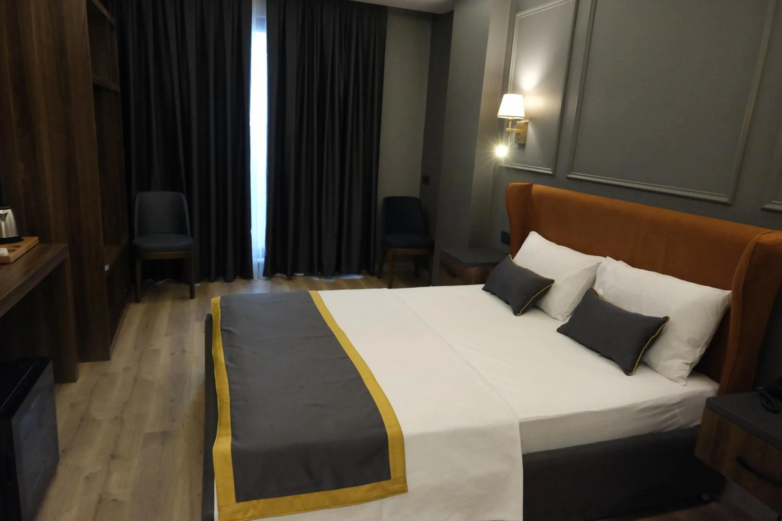 Bed in The Pearl Airport Hotel