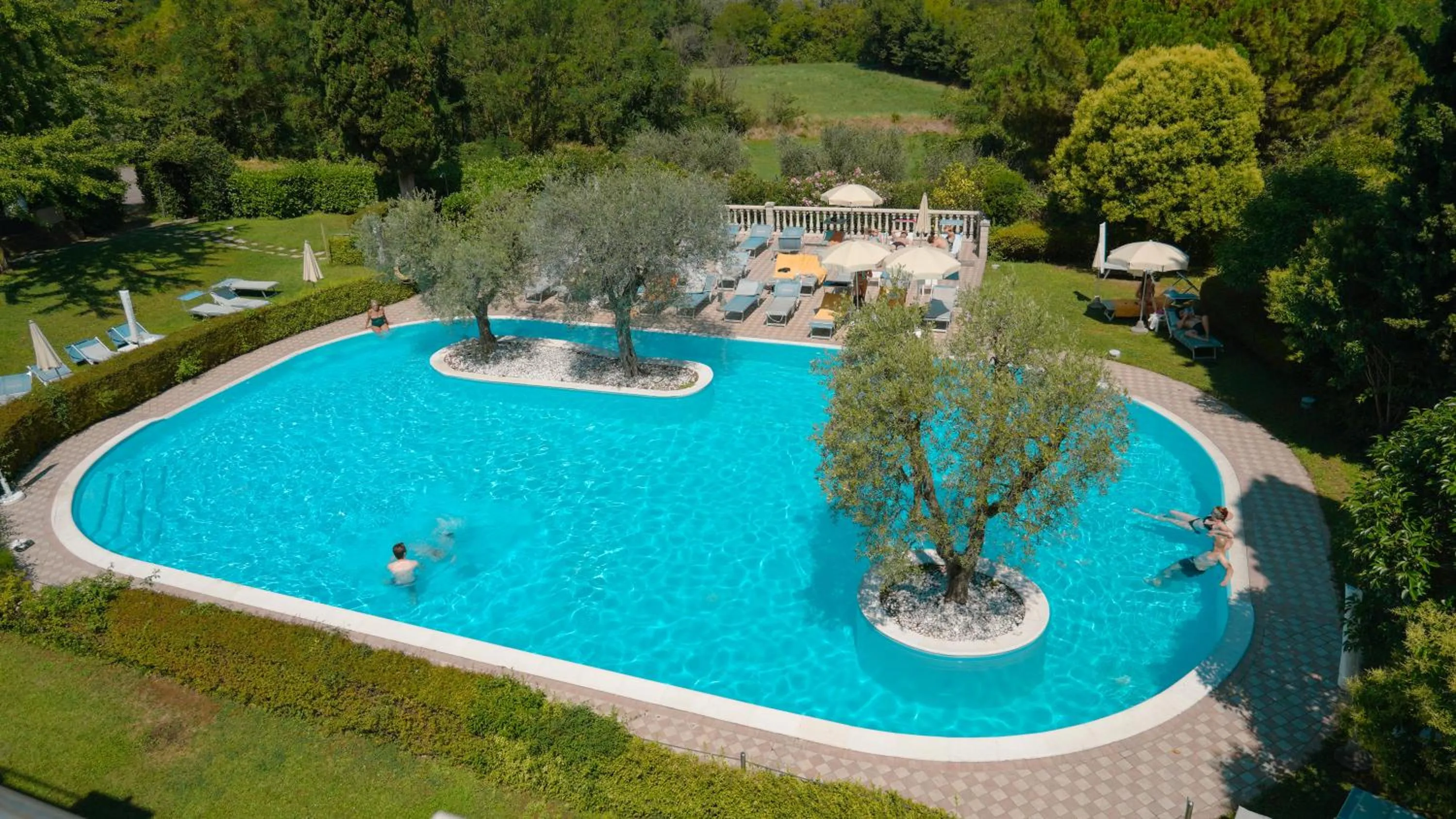 Swimming pool in AHG Golf Hotel Porta Del Sole