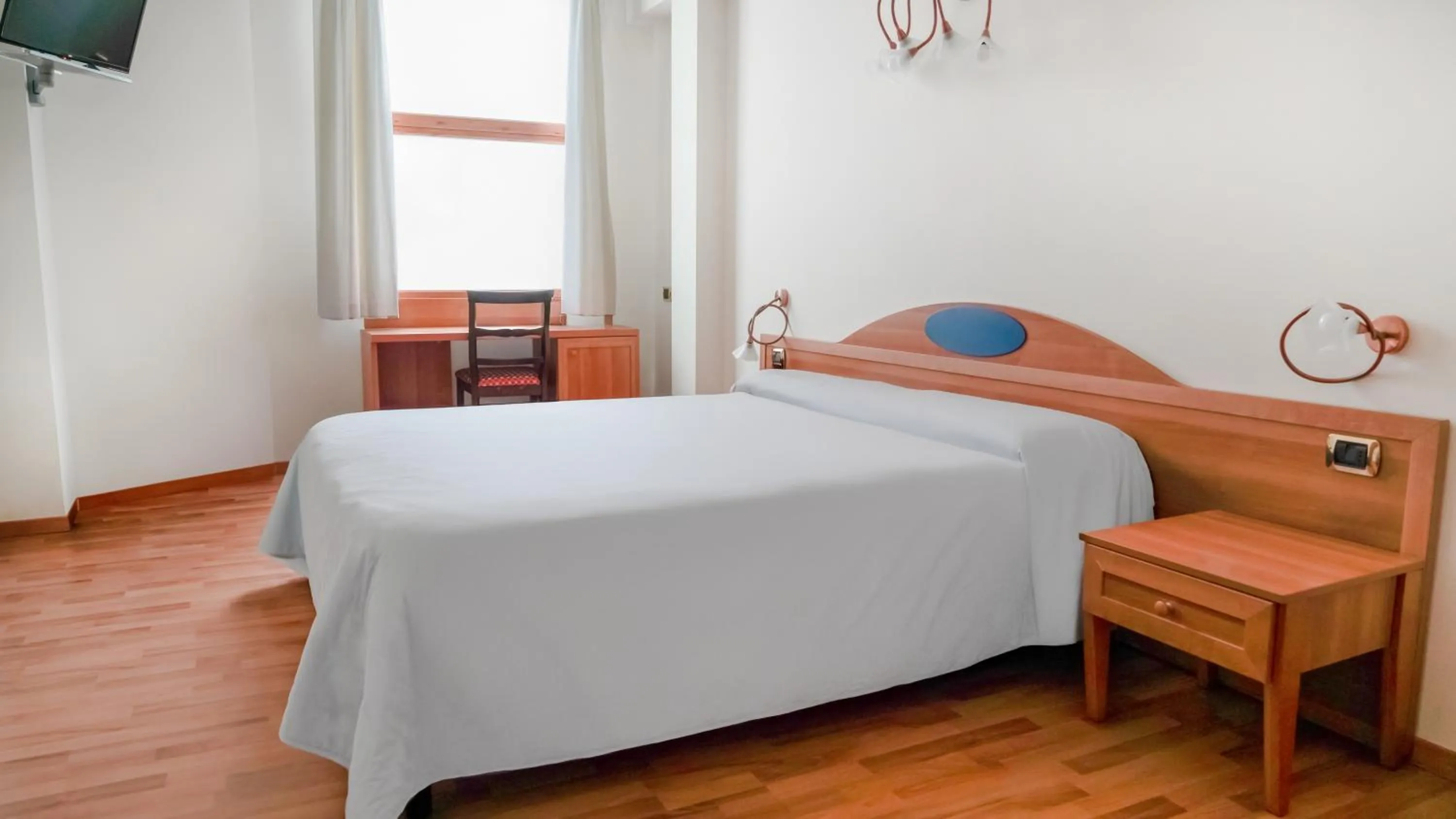 Bedroom, Bed in AHG Golf Hotel Porta Del Sole