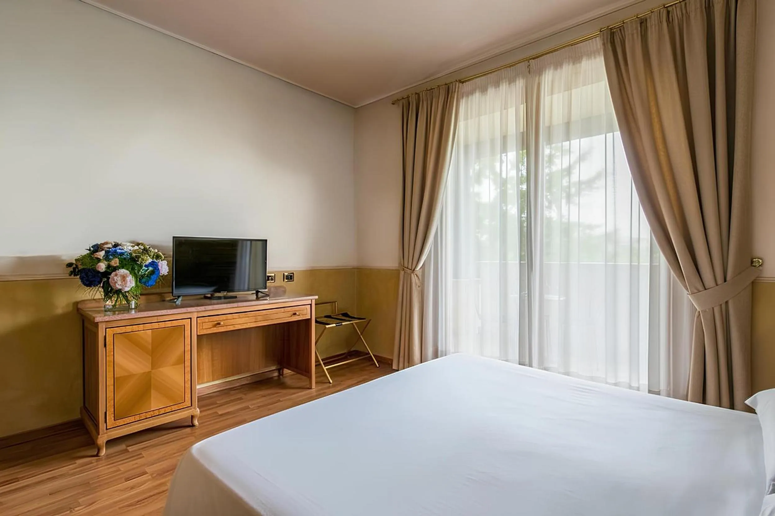 Bed in AHG Golf Hotel Porta Del Sole