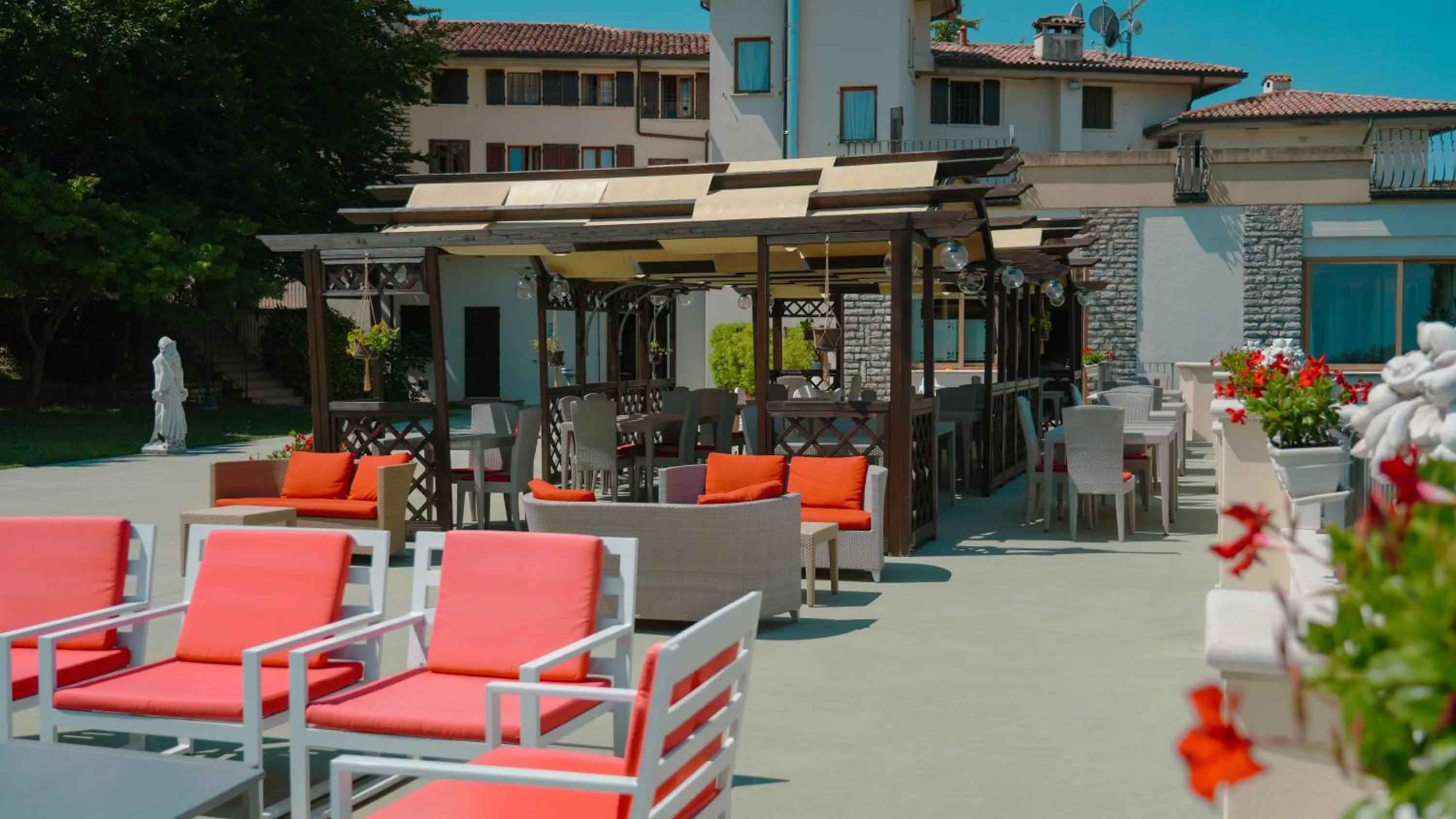 Patio in AHG Golf Hotel Porta Del Sole