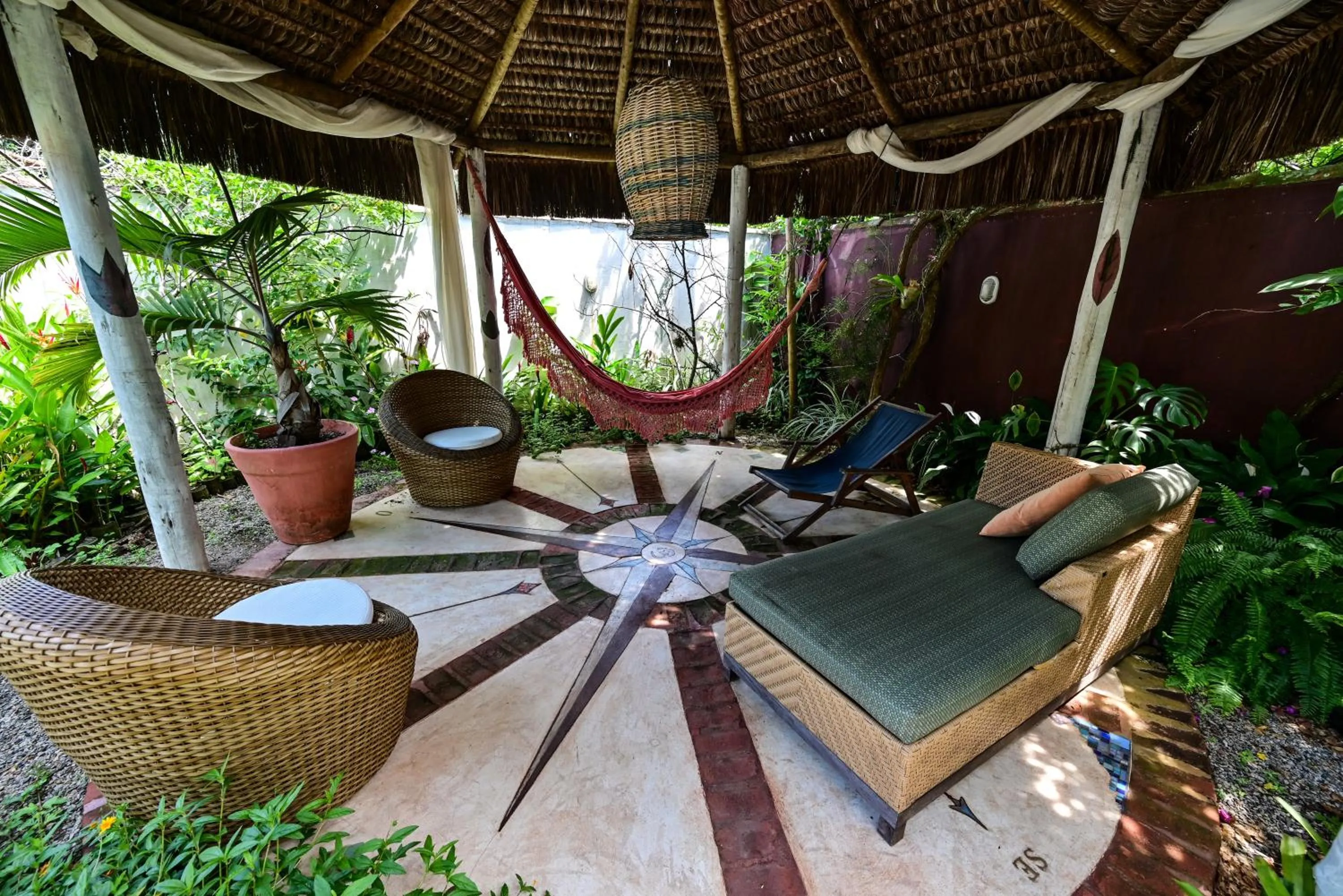 Seating area in Gambá Casa Boutique