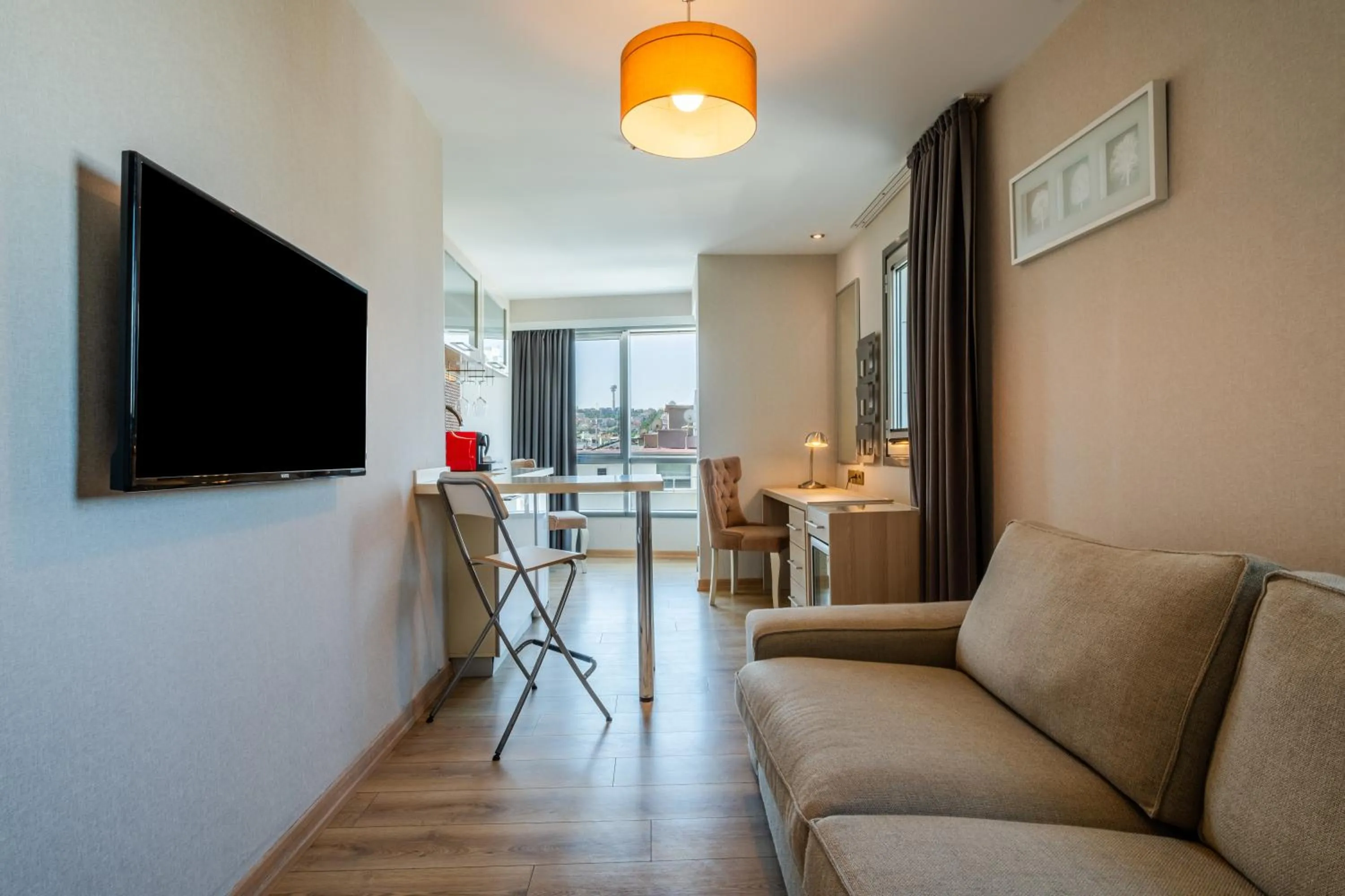 Communal lounge/ TV room in Ramada by Wyndham Ankara