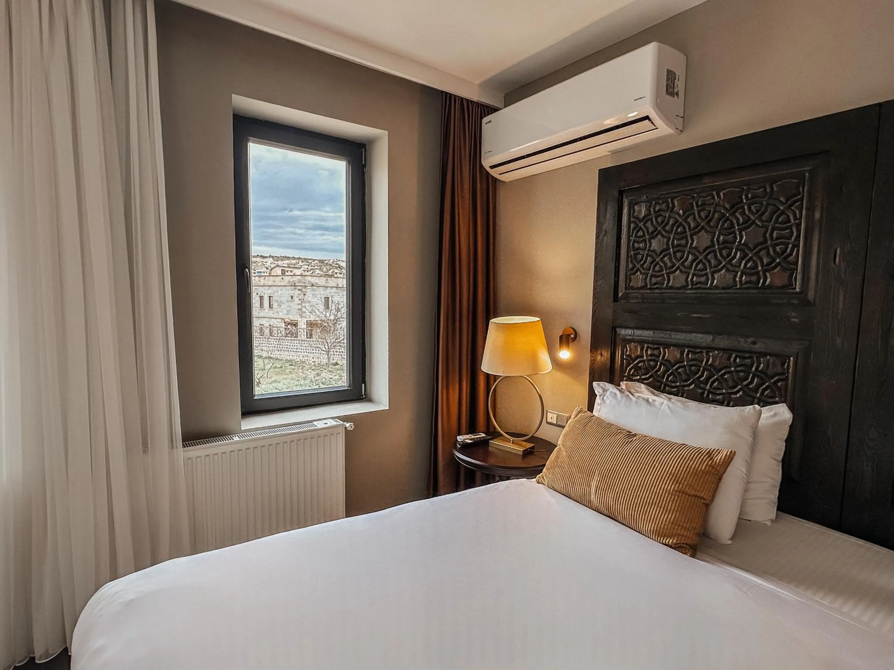 Bed in Osmanli Cappadocia Hotel