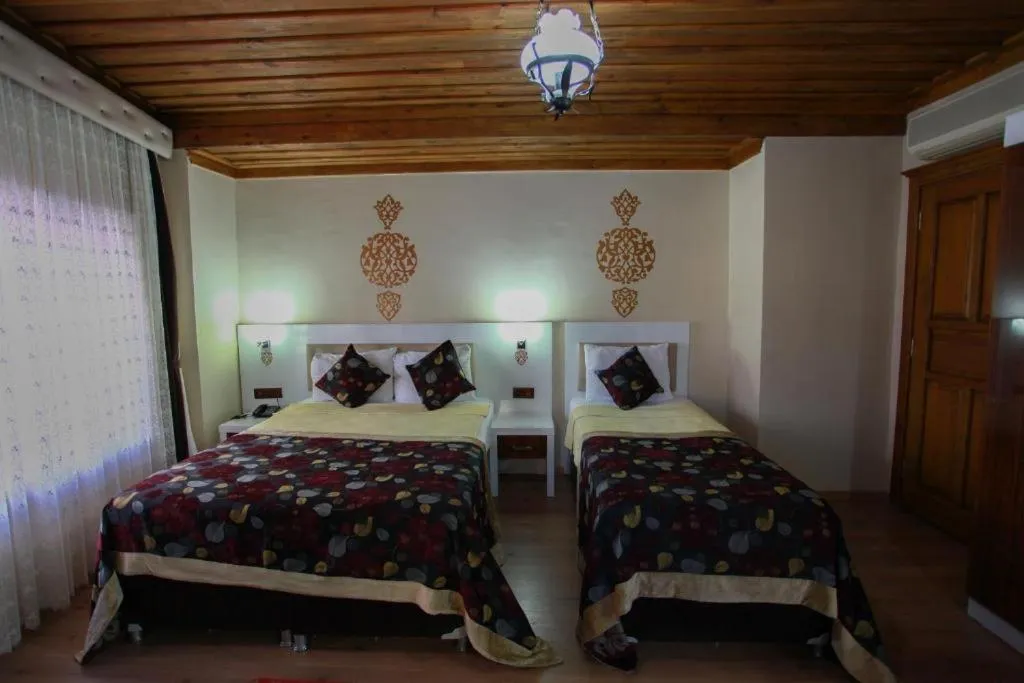 Bed in Bacchus Pension