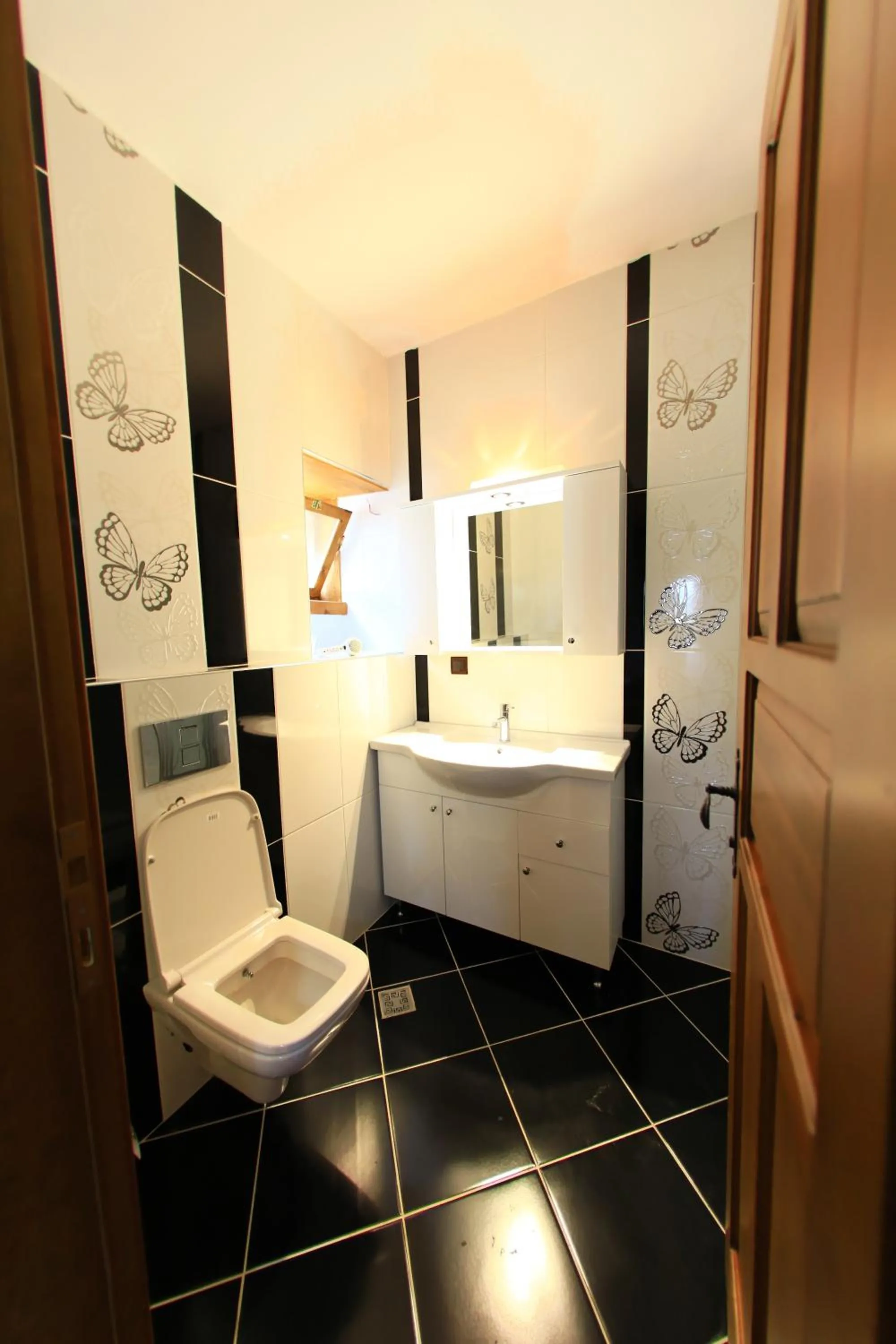 Bathroom, Bed in Bacchus Pension