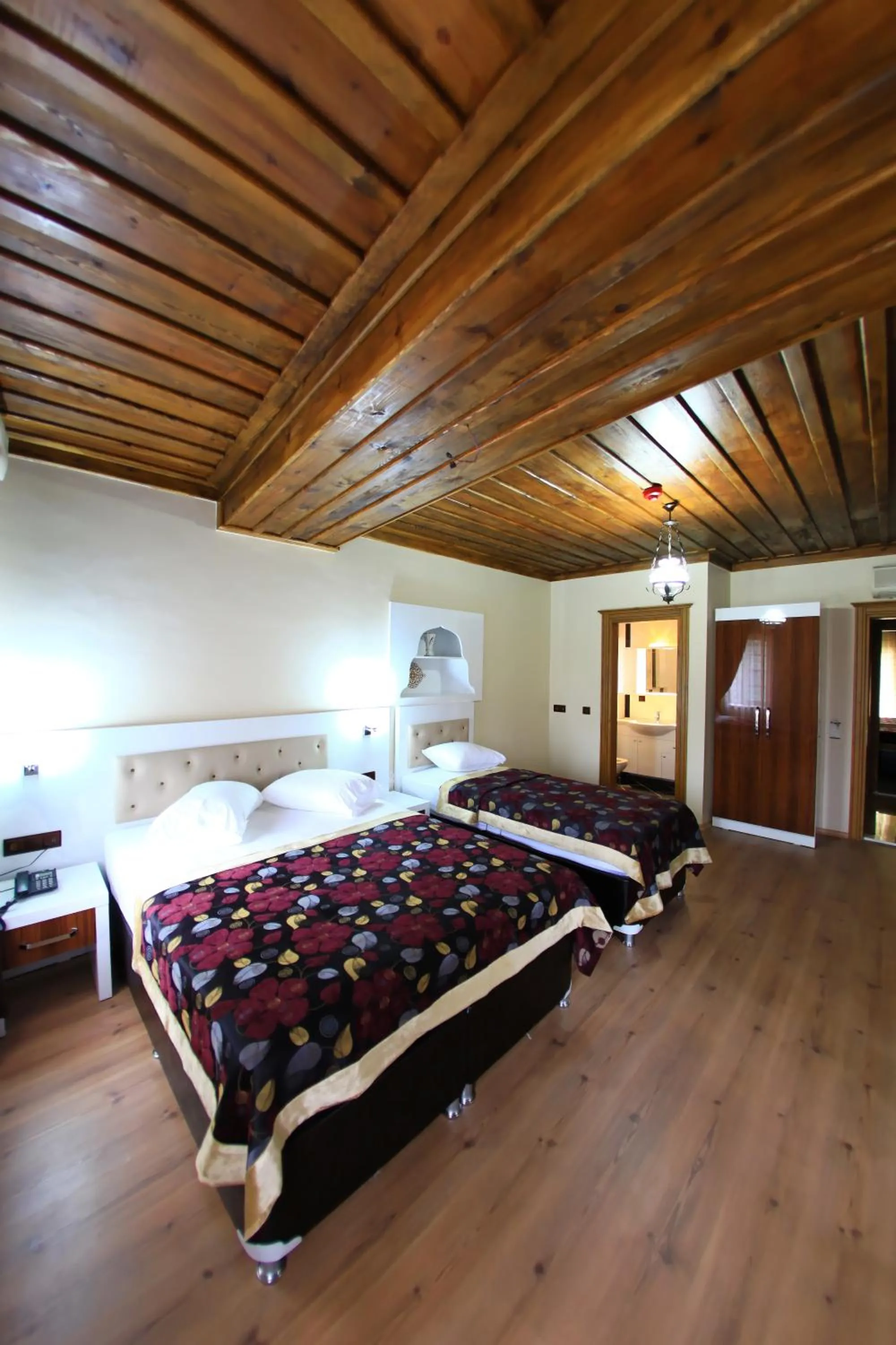 Decorative detail, Bed in Bacchus Pension