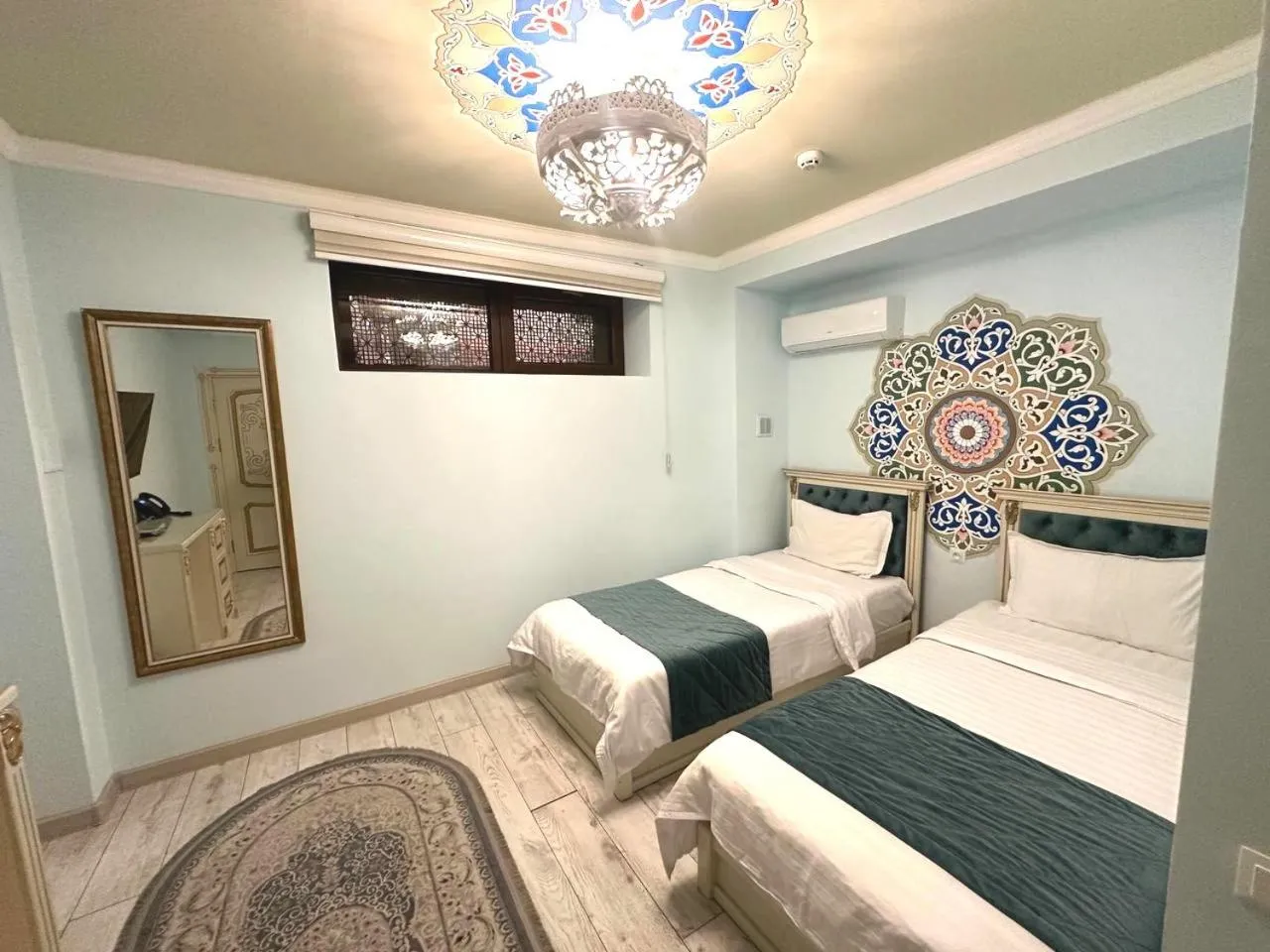 Bed in Gur Emir Palace boutique hotel