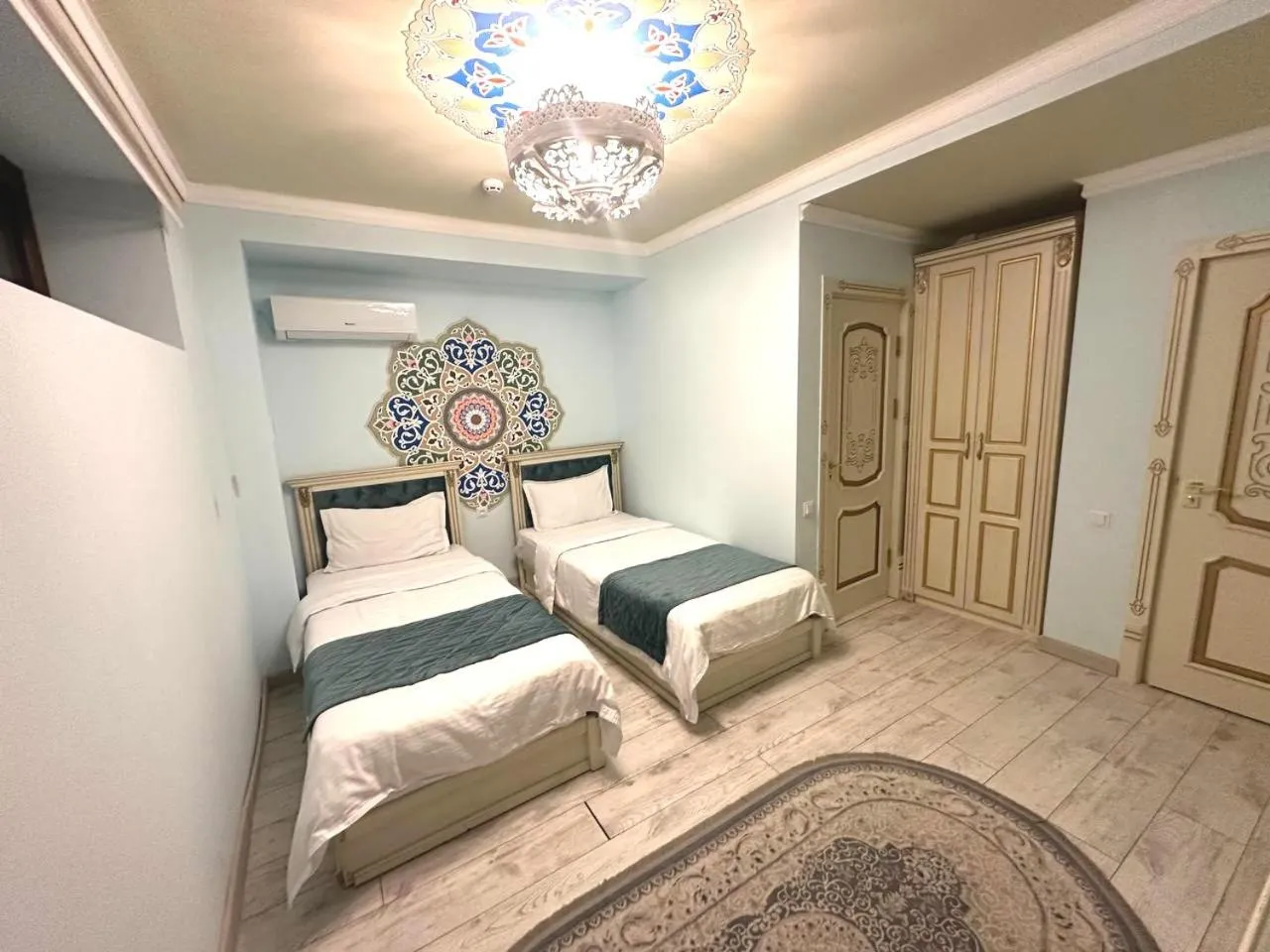 Bed in Gur Emir Palace boutique hotel