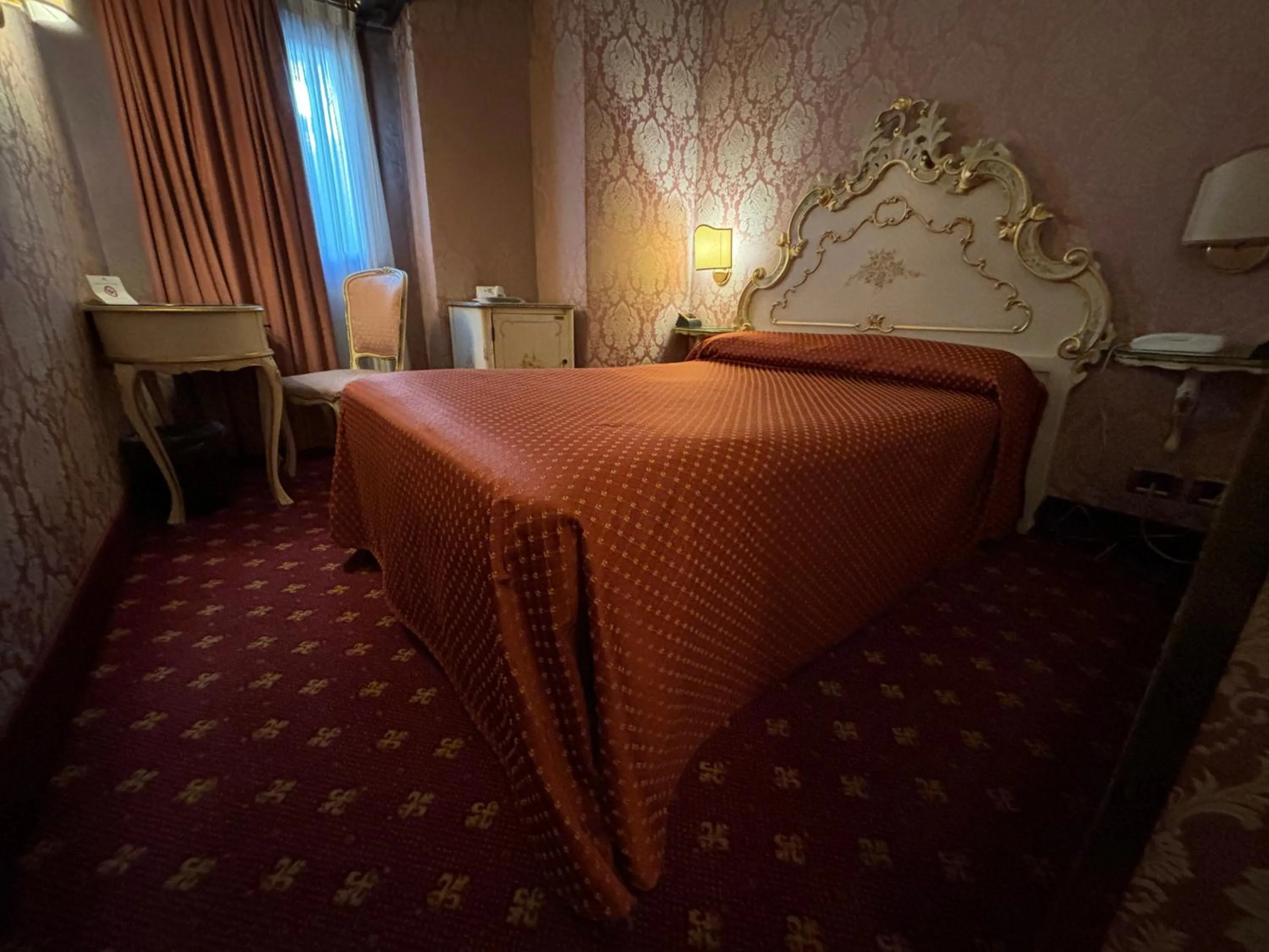 Bed in Hotel Rialto
